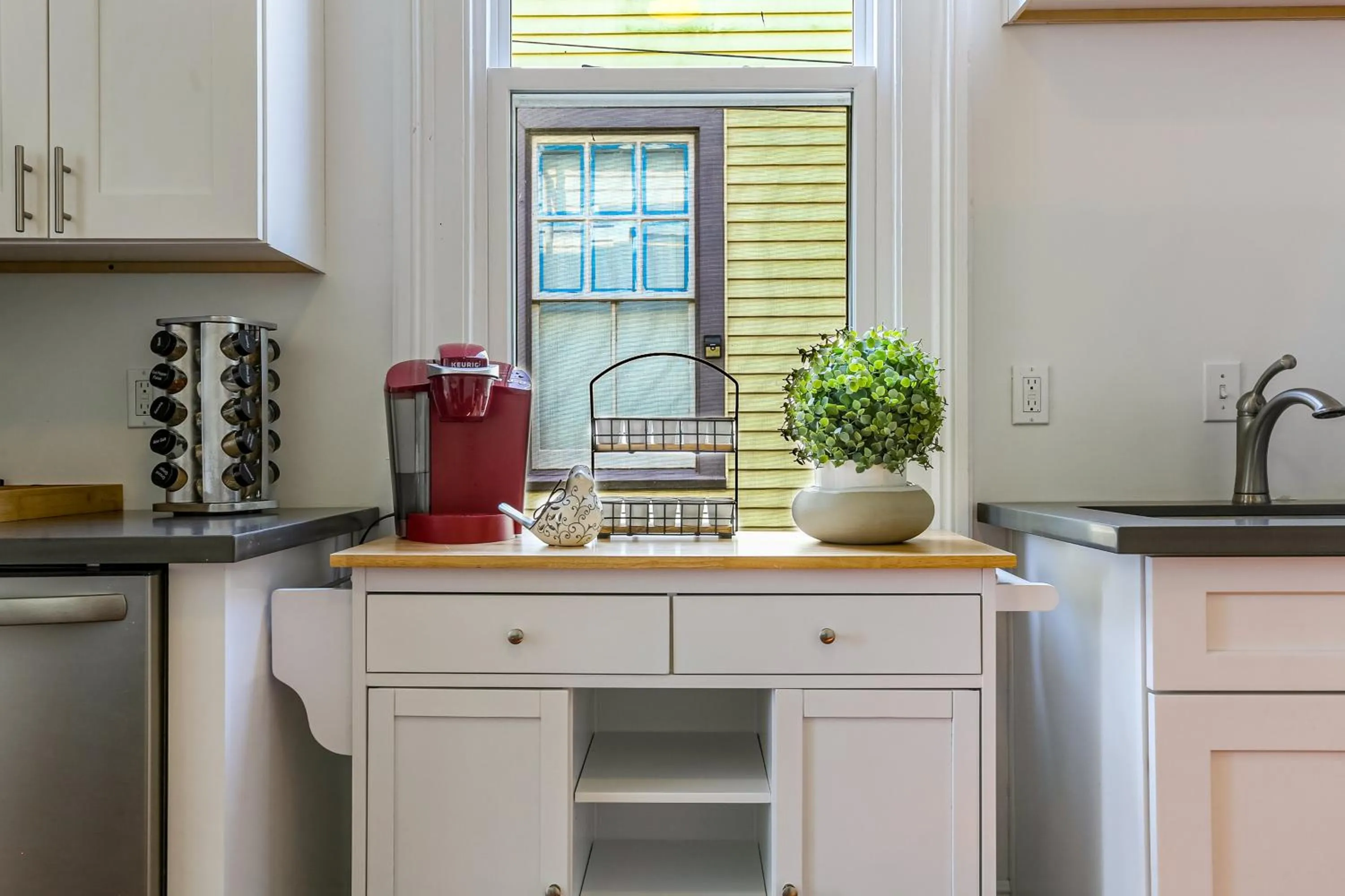 kitchen in Private 2BR in Uptown by Hosteeva