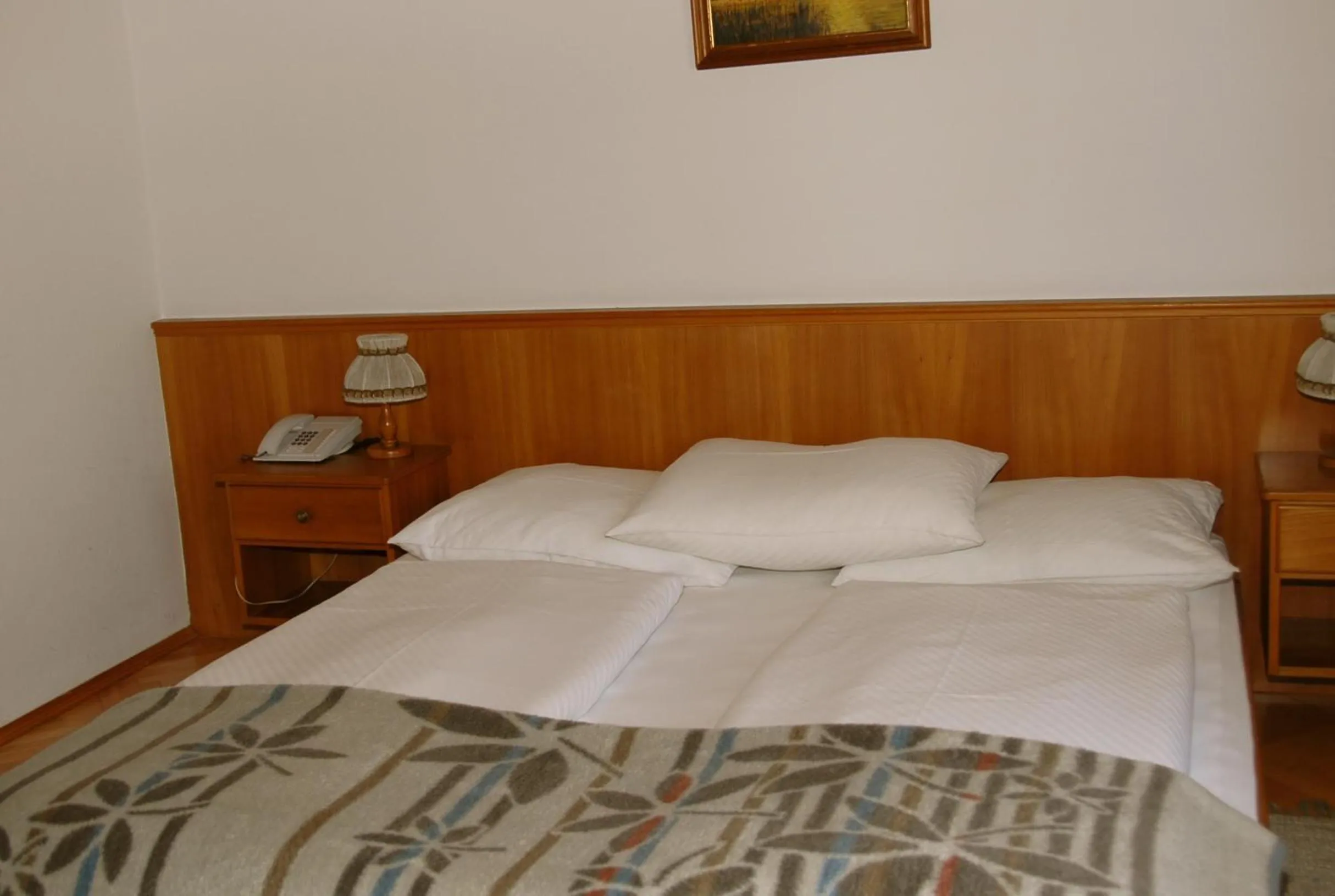 Bed in Hotel Velden Bacherlwirt