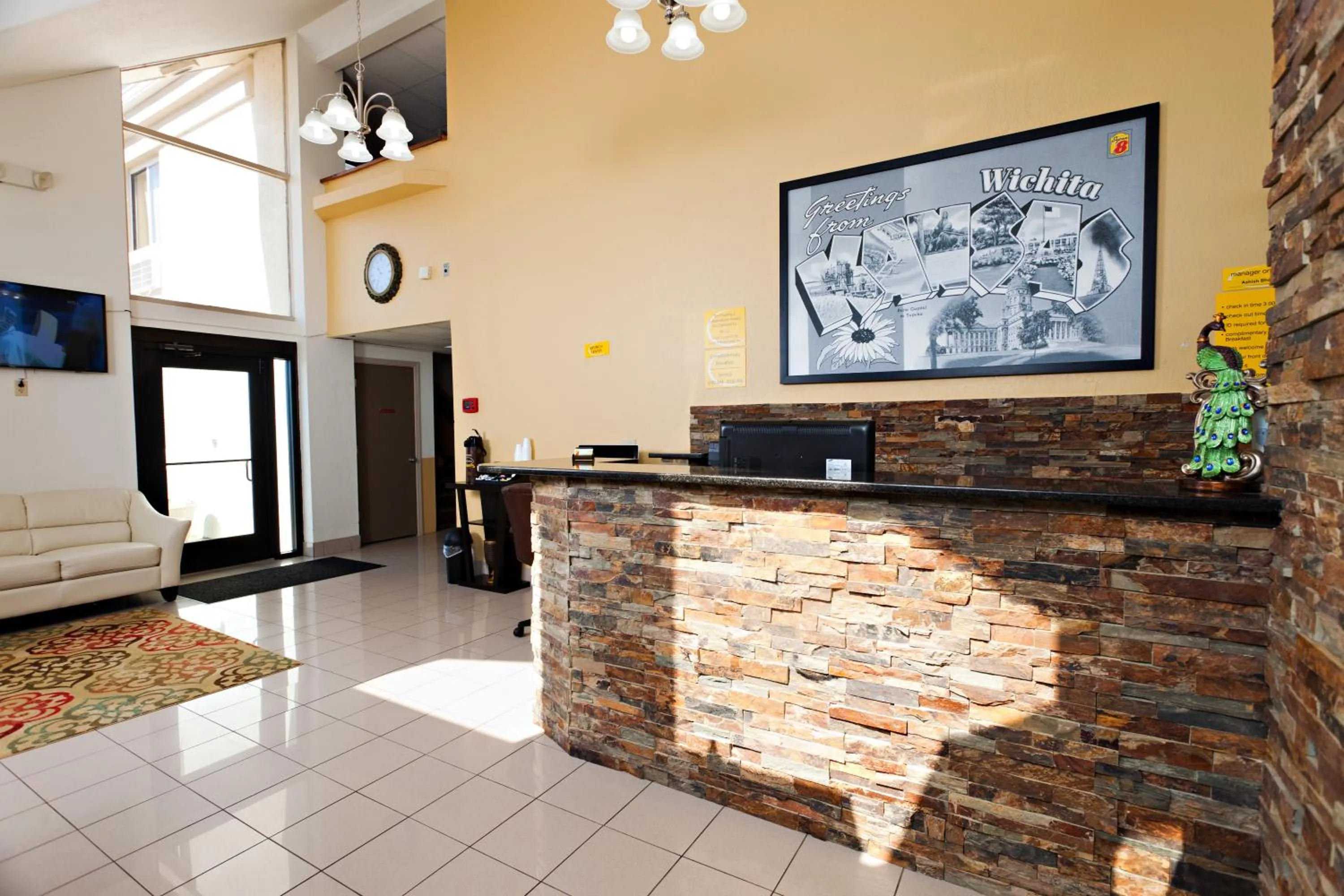 Lobby or reception in Super 8 by Wyndham Wichita Airport West Kellogg