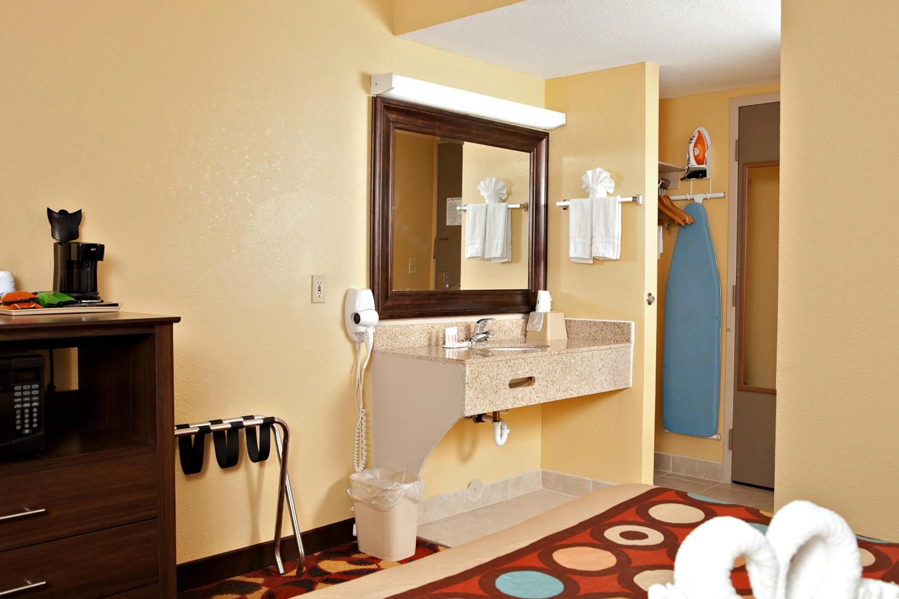 Toilet in Super 8 by Wyndham Wichita Airport West Kellogg