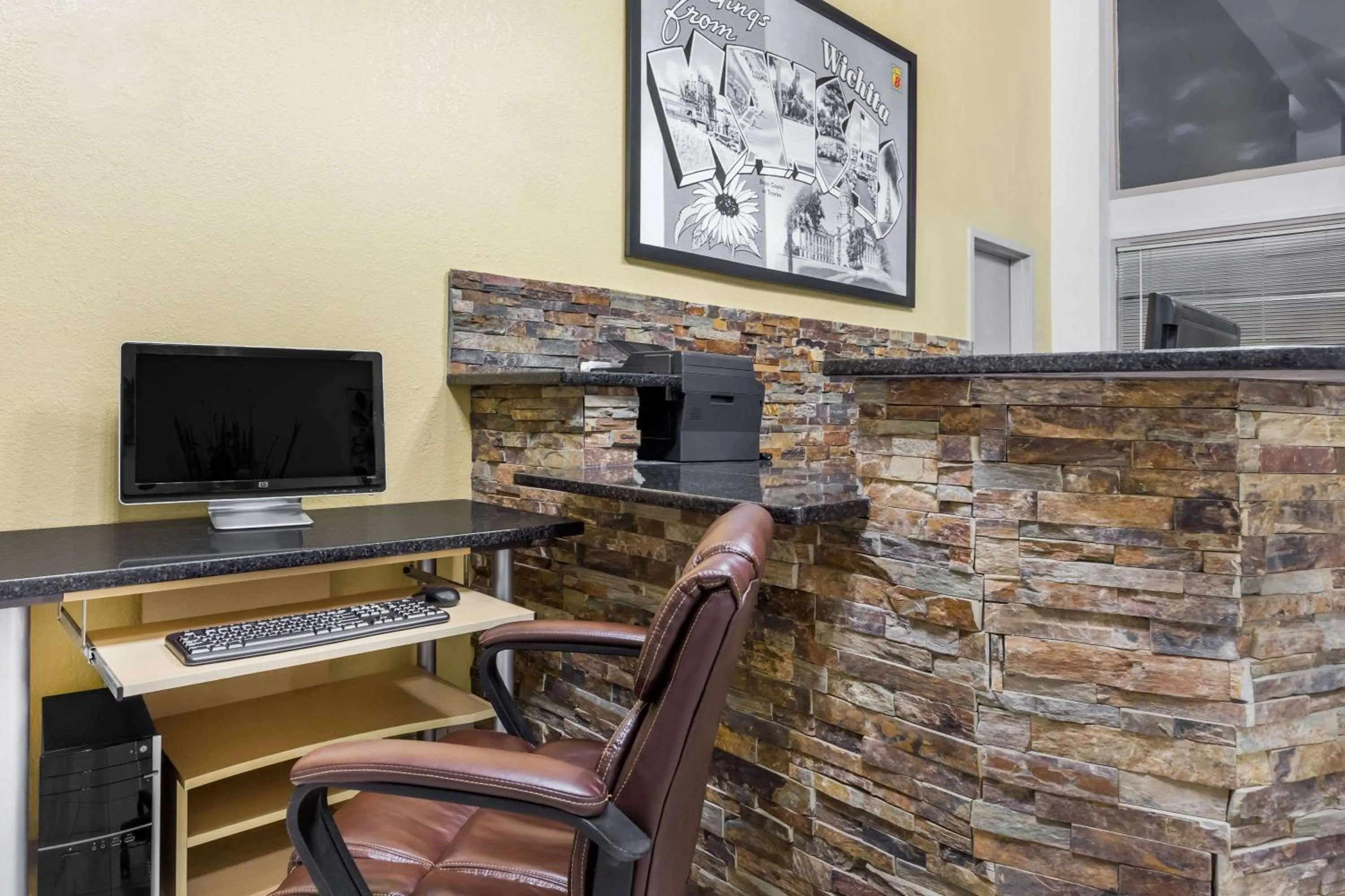 Lobby or reception in Super 8 by Wyndham Wichita Airport West Kellogg