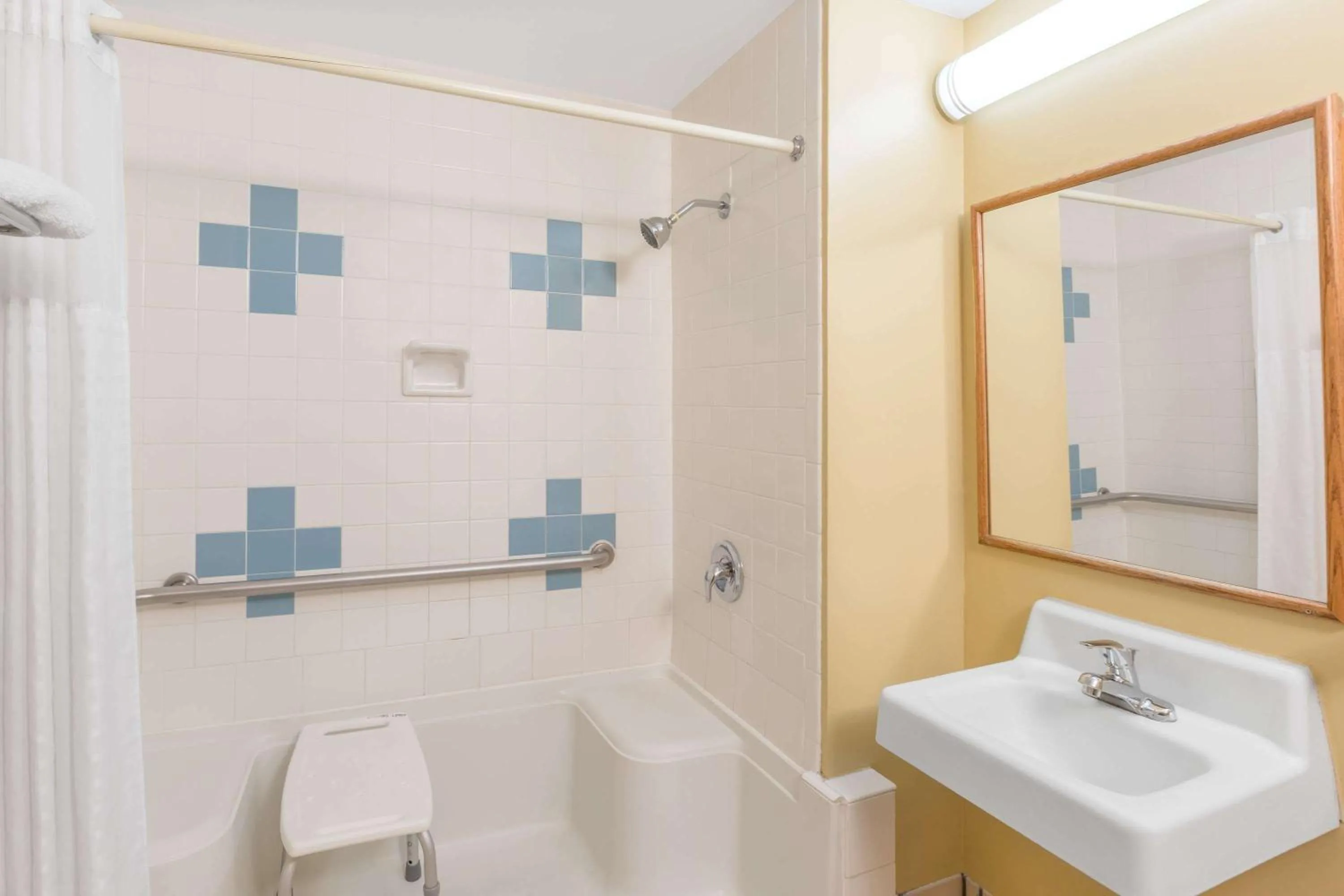 Shower in Super 8 by Wyndham Wichita Airport West Kellogg