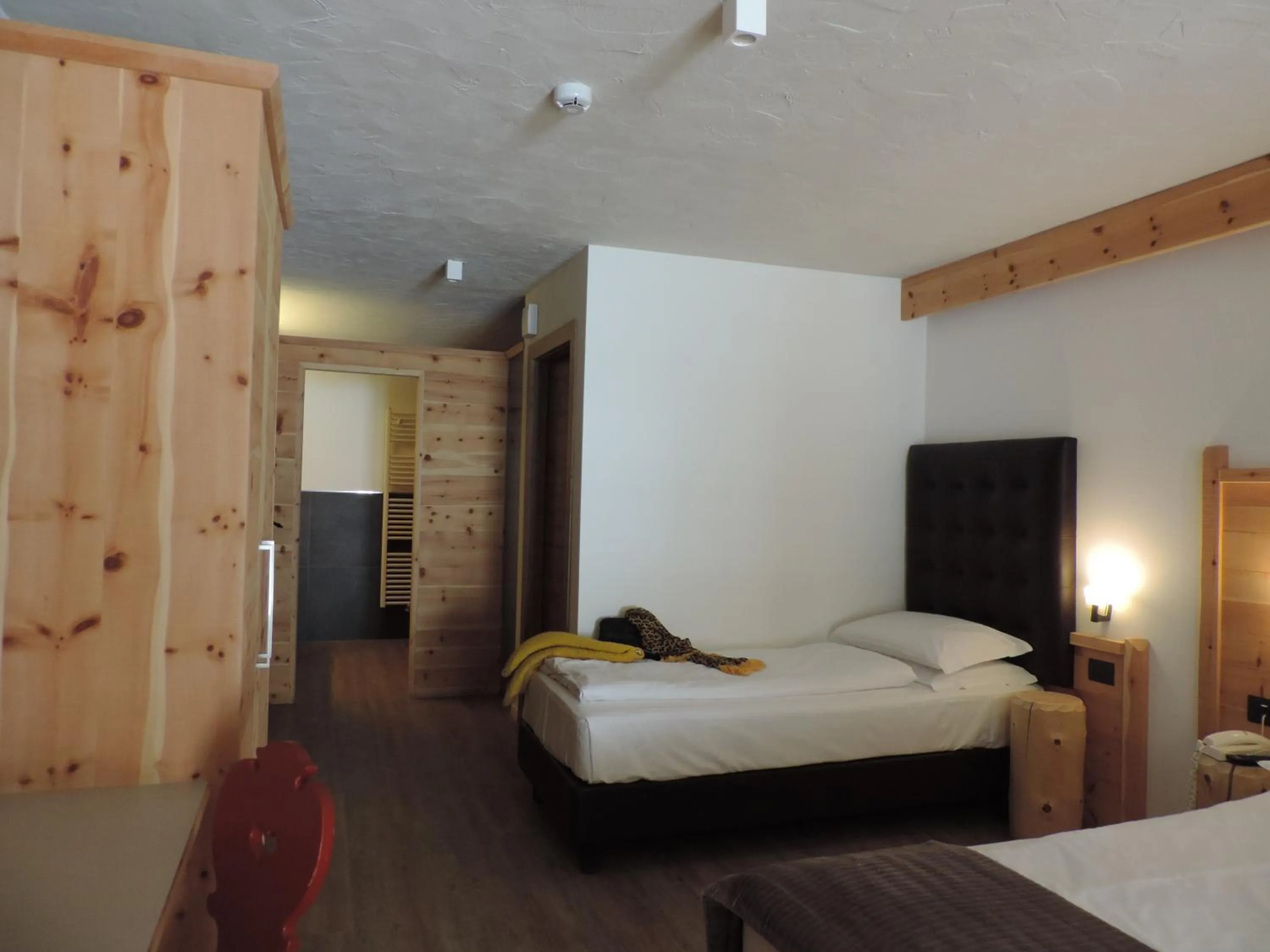 Bed in Hotel Scoiattolo