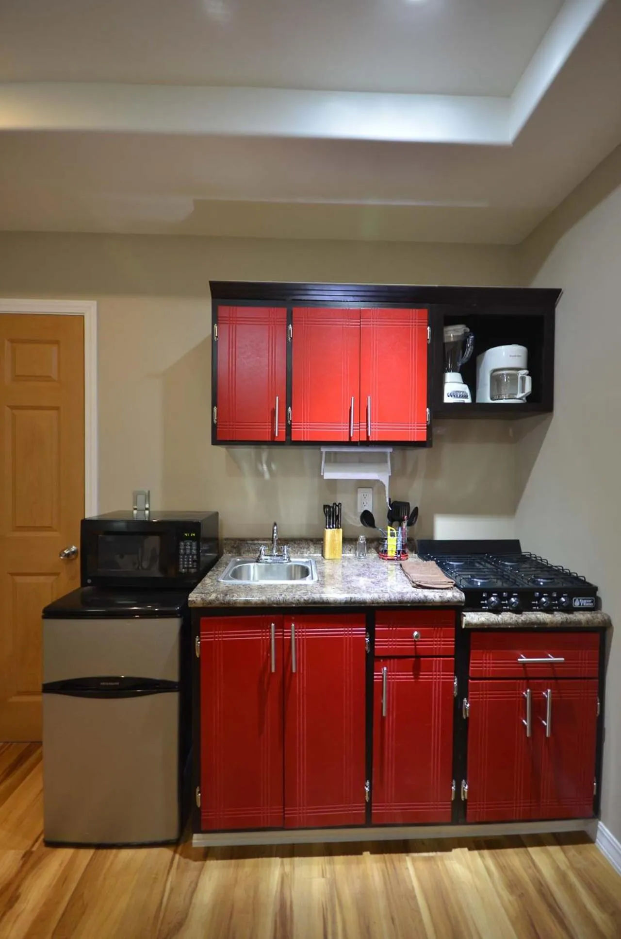 Kitchen or kitchenette in Suites del Sol