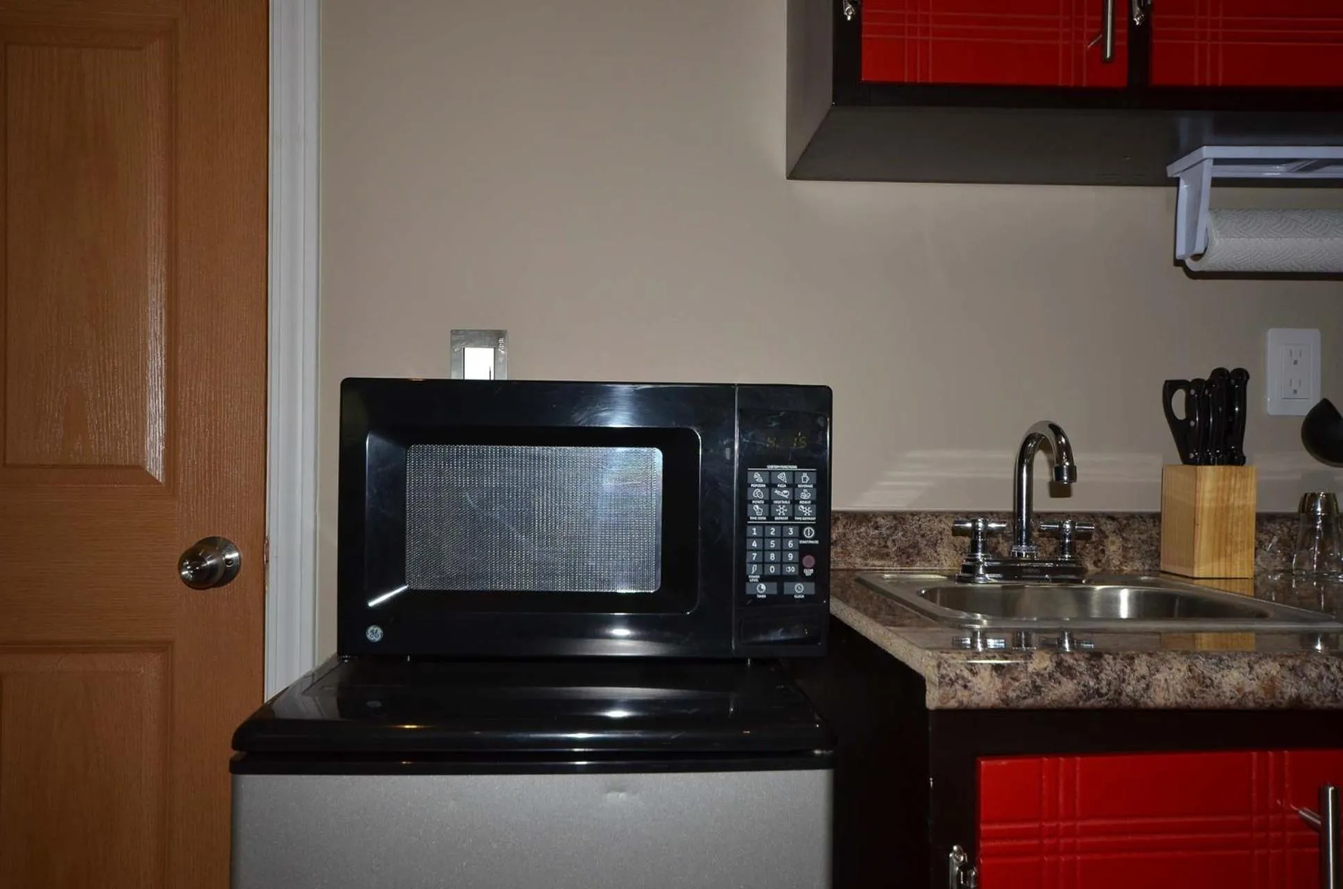 Kitchen or kitchenette in Suites del Sol