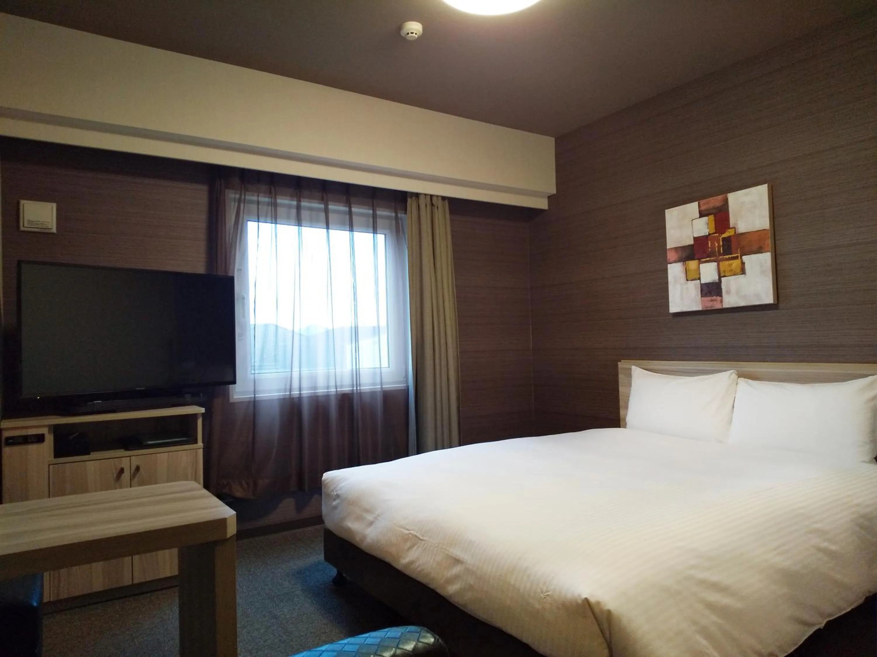 Photo of the whole room, Bed in Hotel Route-Inn Ishioka