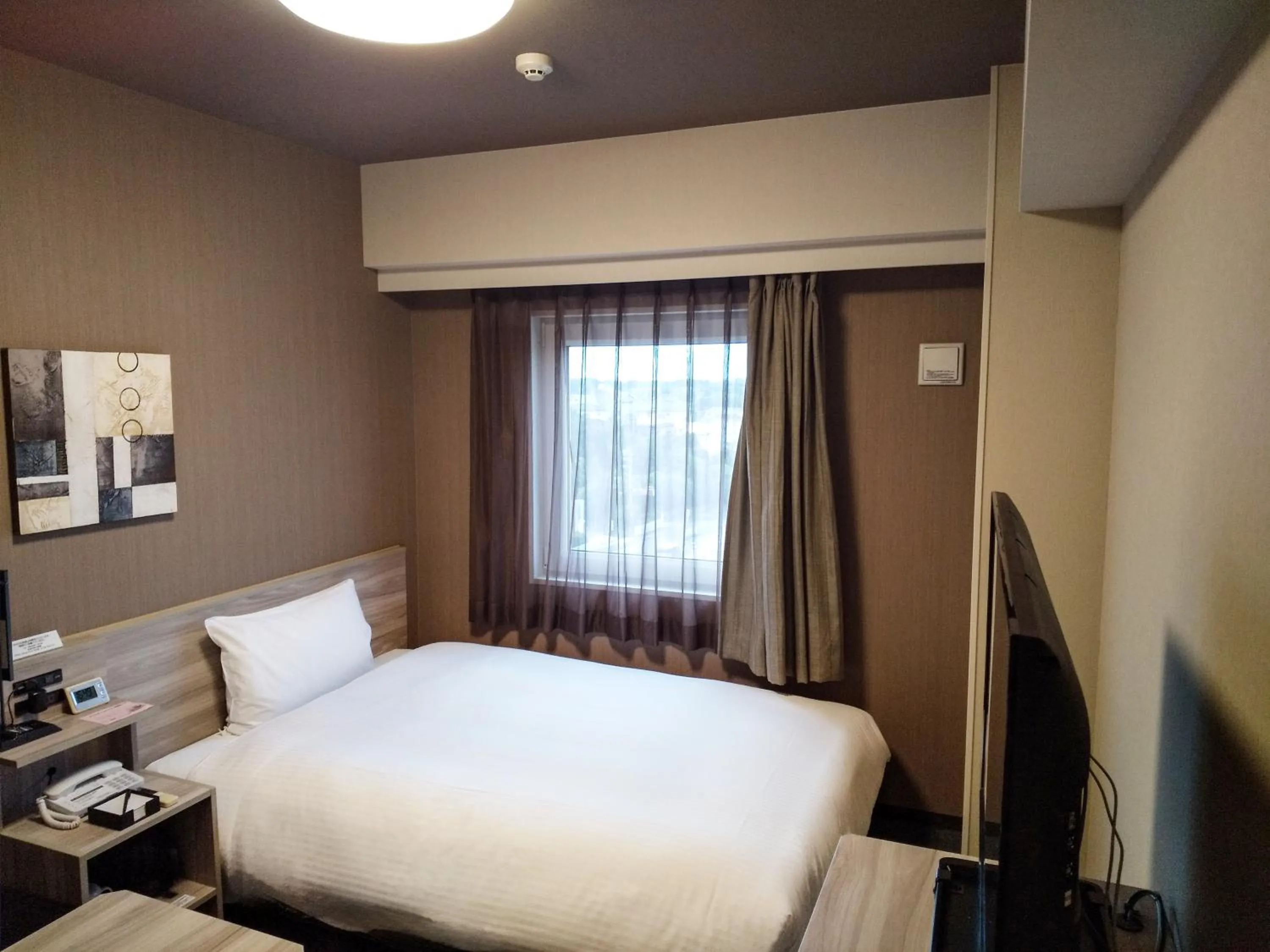 Photo of the whole room, Bed in Hotel Route-Inn Ishioka
