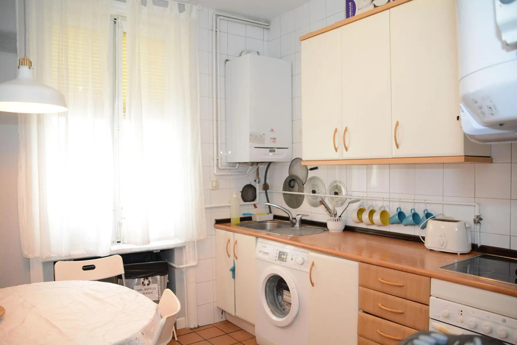 Communal kitchen in Alvaro Residencia