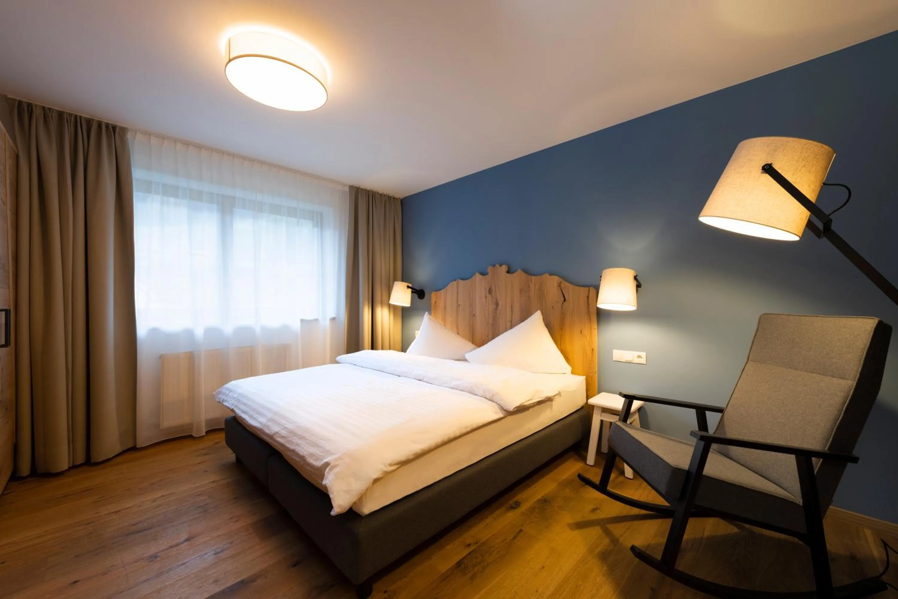 Bed in Sepp & Hannis Suiten im Dorf