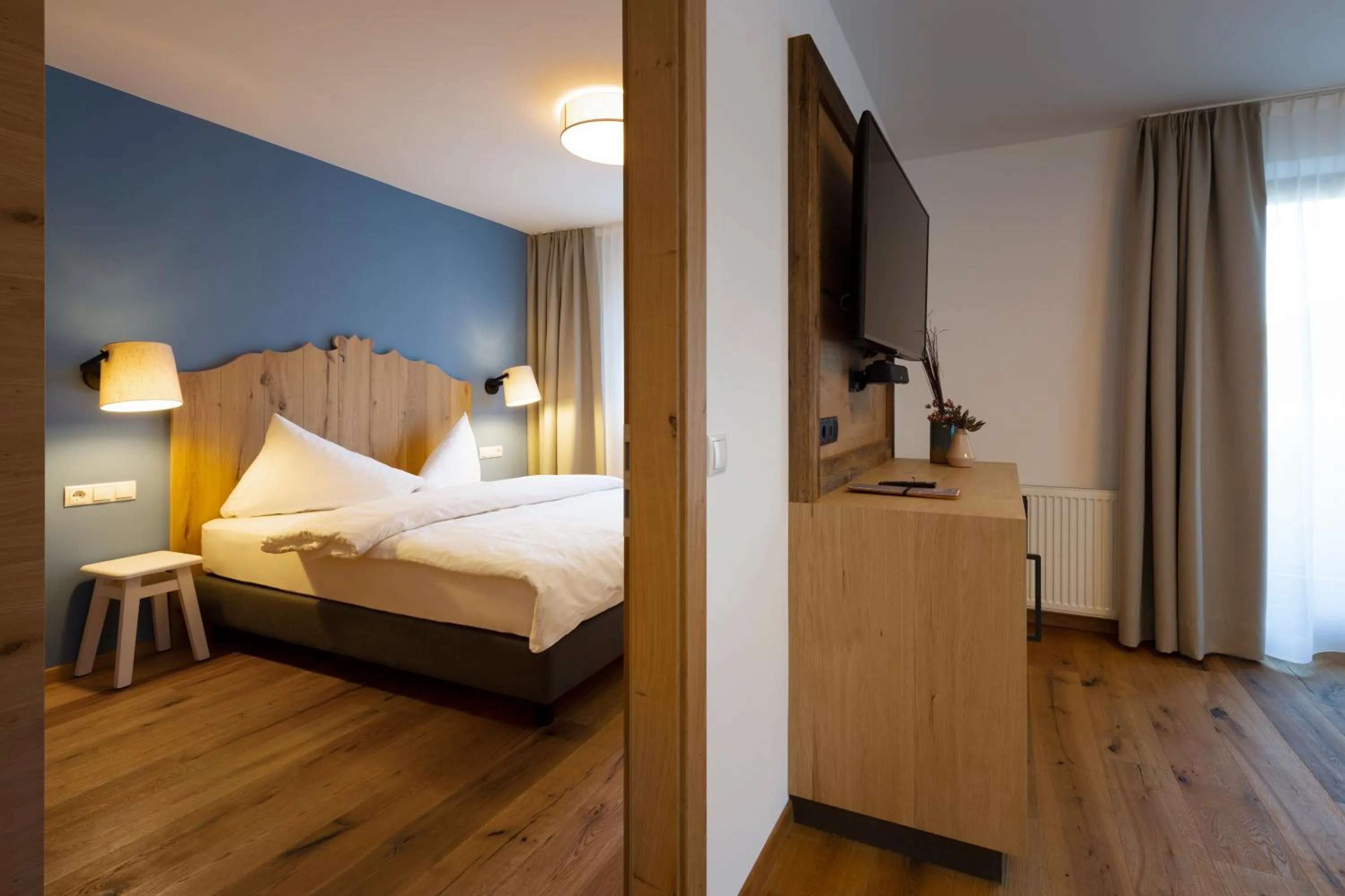 Living room, Bed in Sepp & Hannis Suiten im Dorf