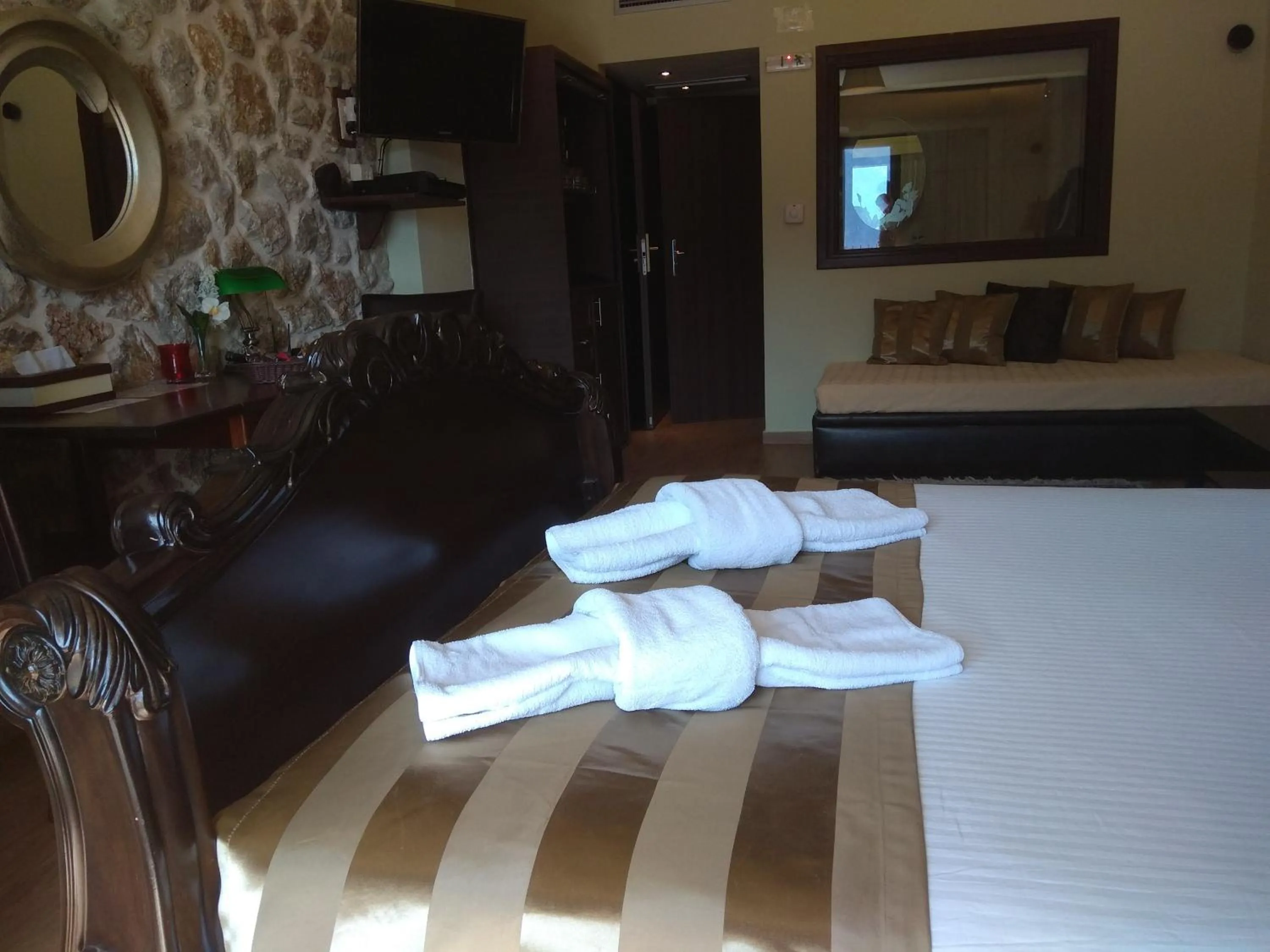 towels, Bed in Archontopetra Boutique Hotel