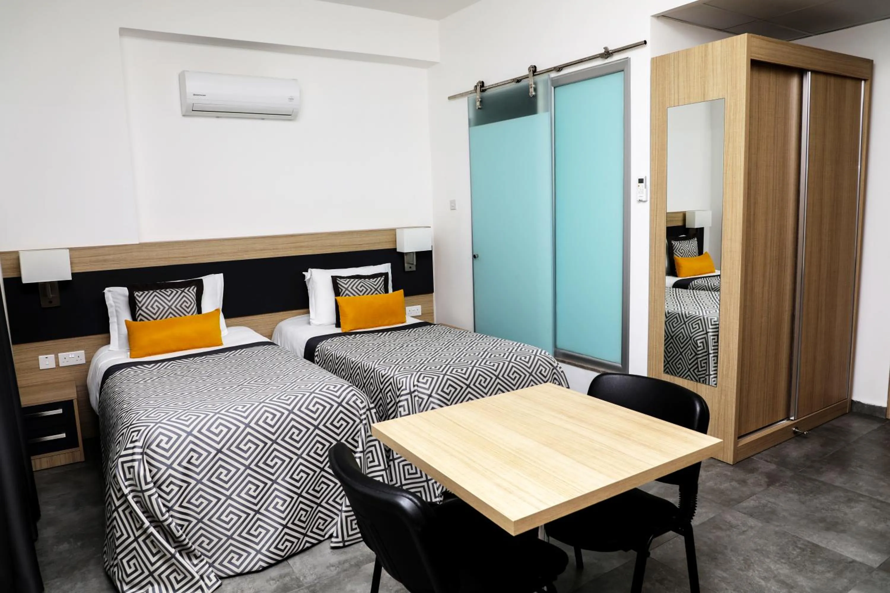 Photo of the whole room, Bed in Sky Roof Hotel