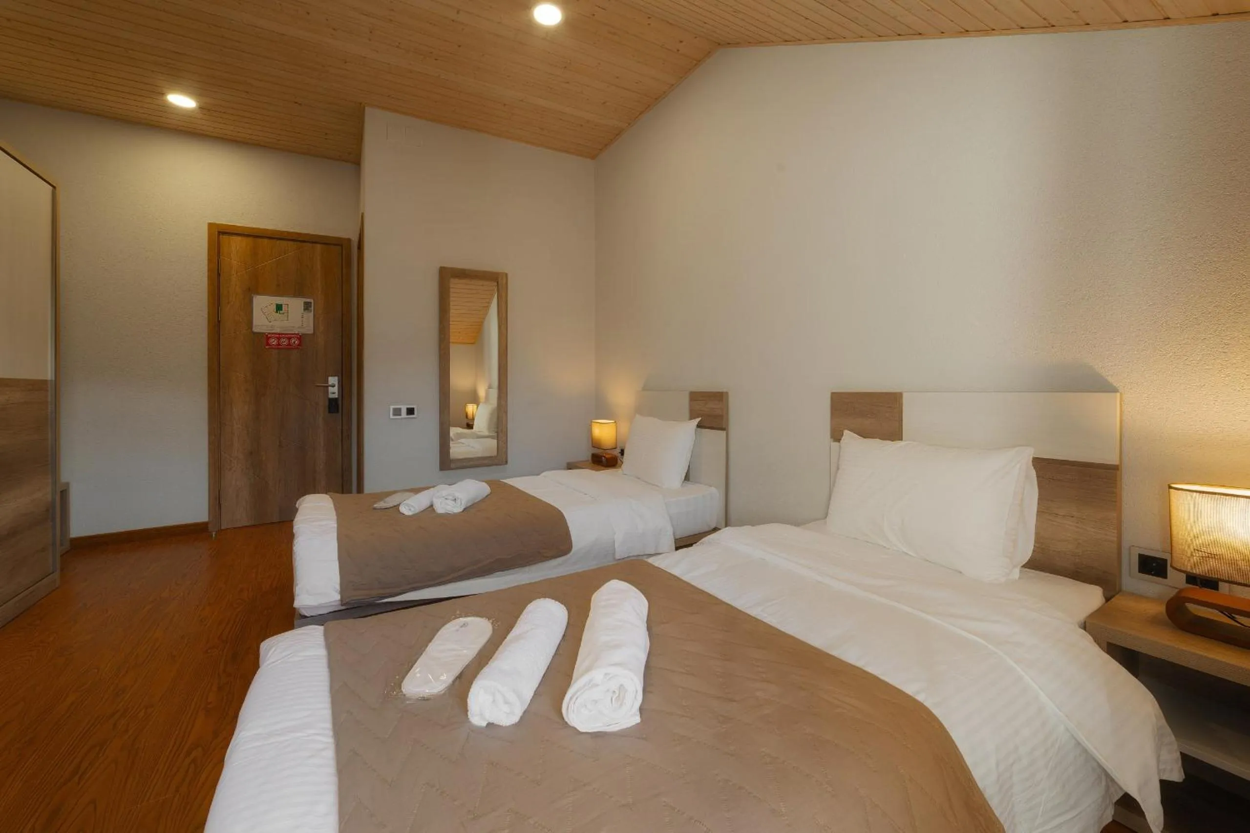 Bed in Ereto Hotel by SnowTime