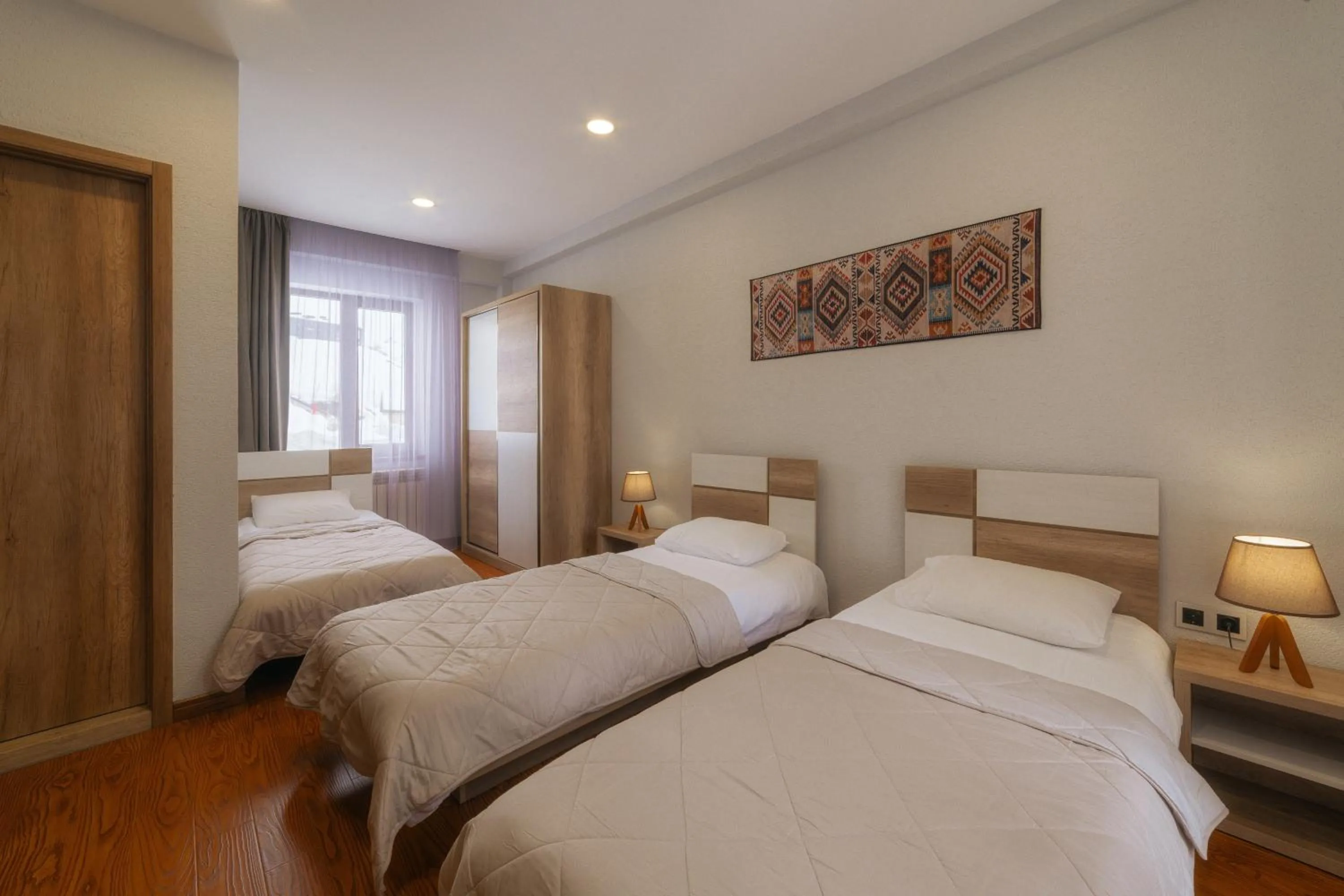 Bed in Ereto Hotel by SnowTime