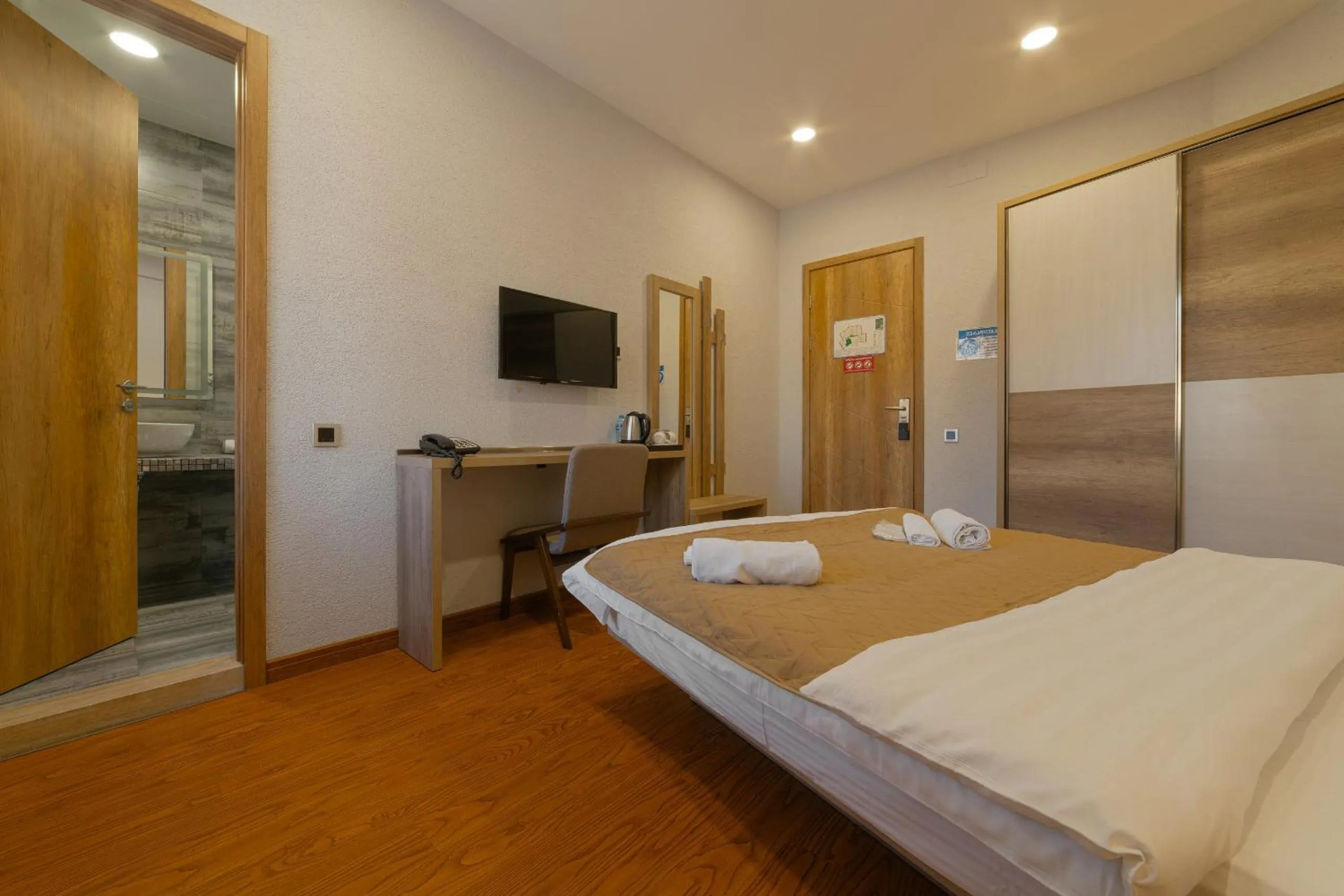 Bed in Ereto Hotel by SnowTime