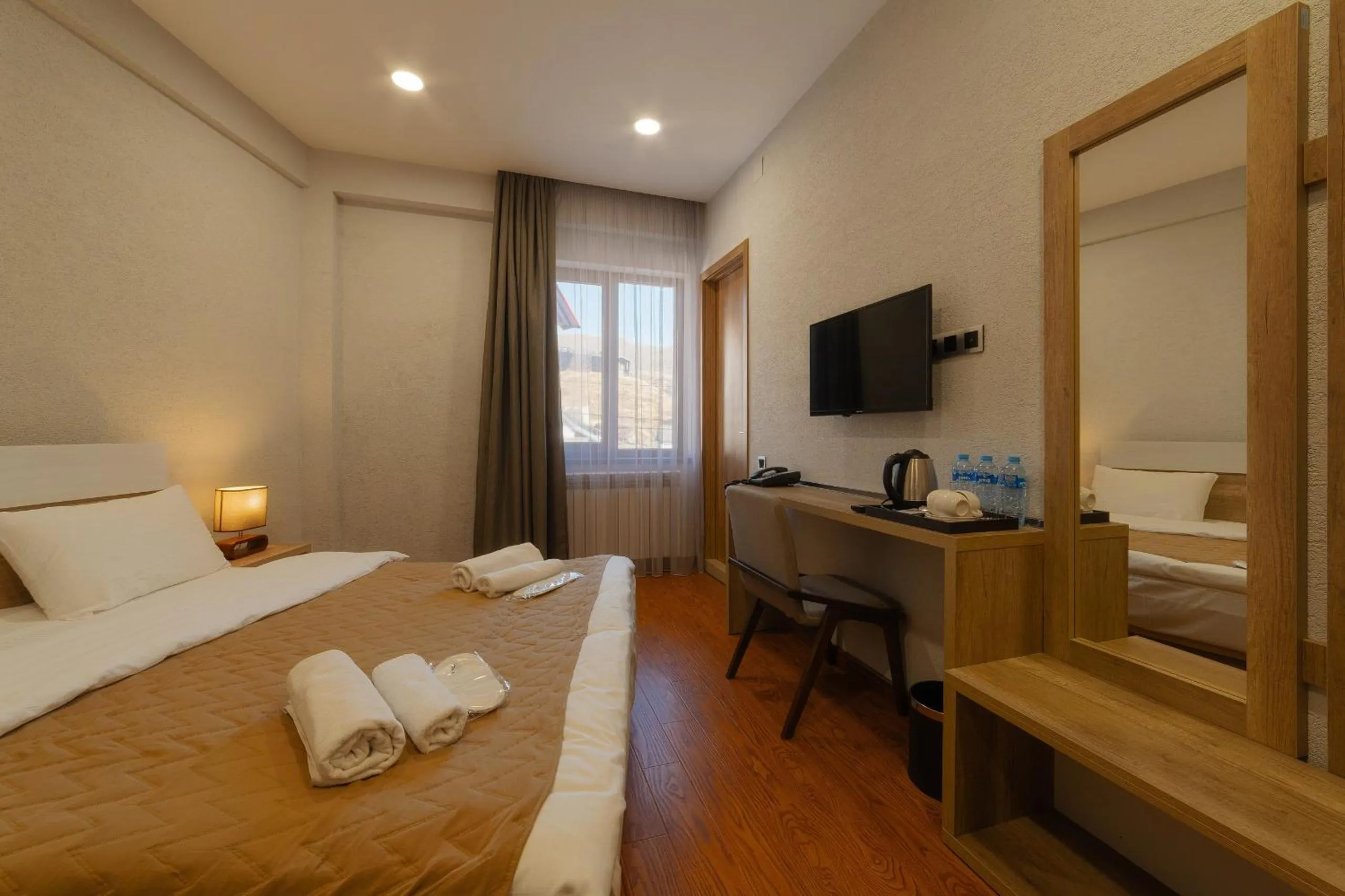 Bed in Ereto Hotel by SnowTime