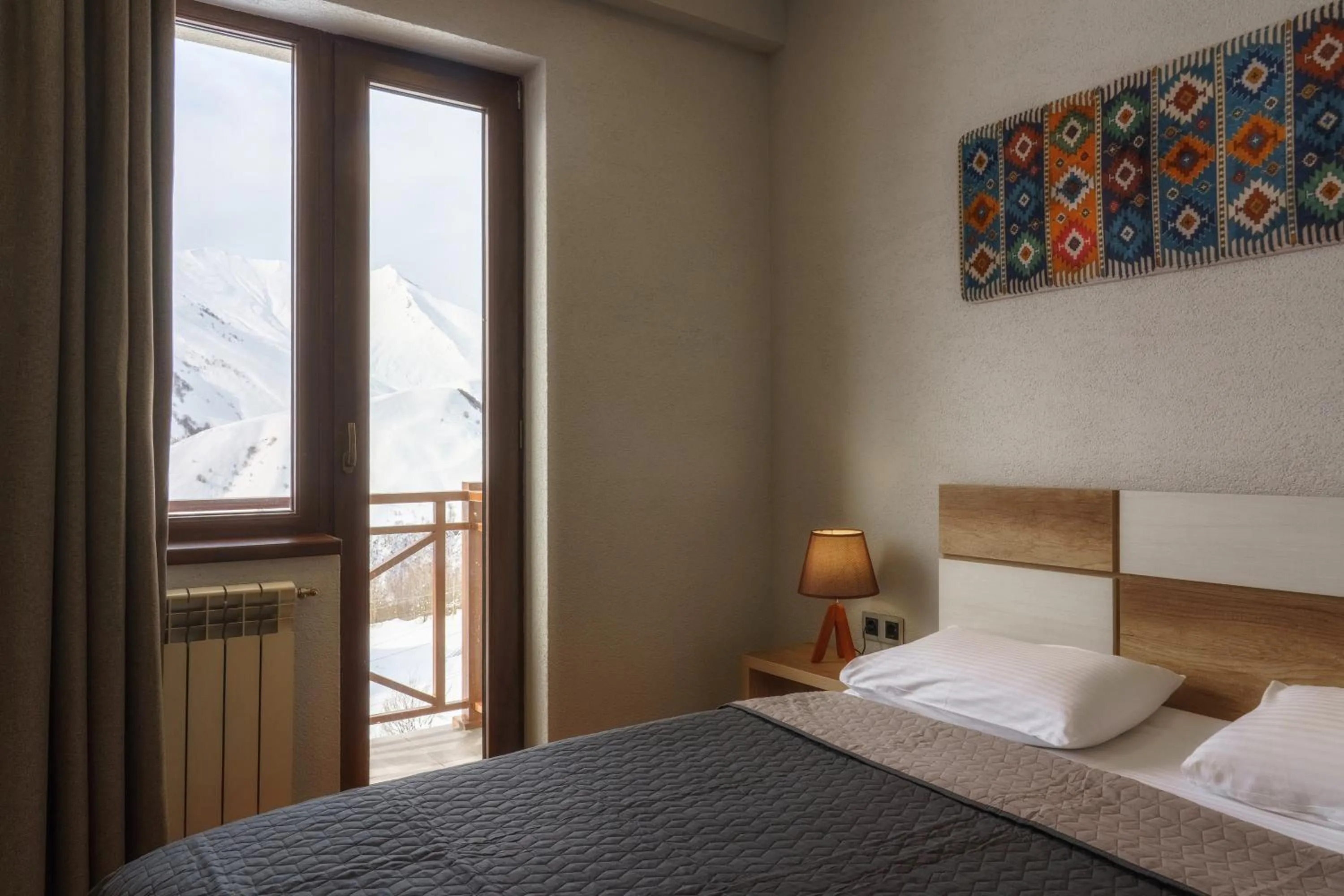 Bed in Ereto Hotel by SnowTime