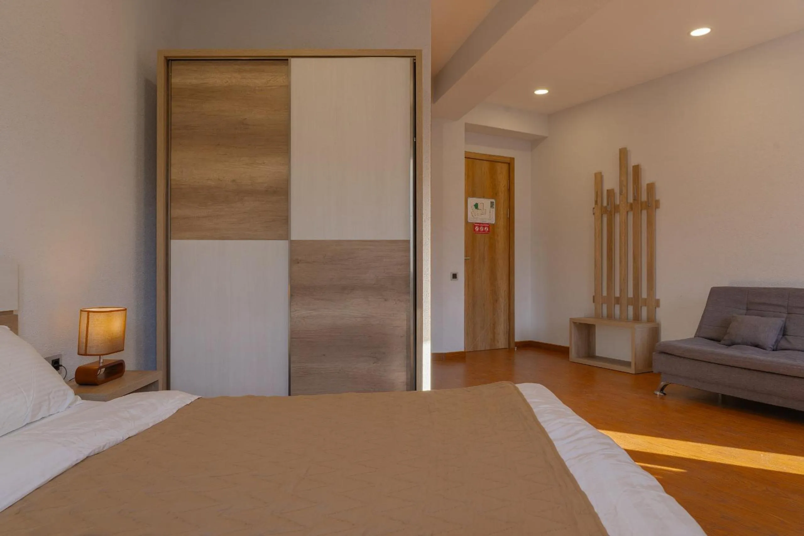 Bed in Ereto Hotel by SnowTime