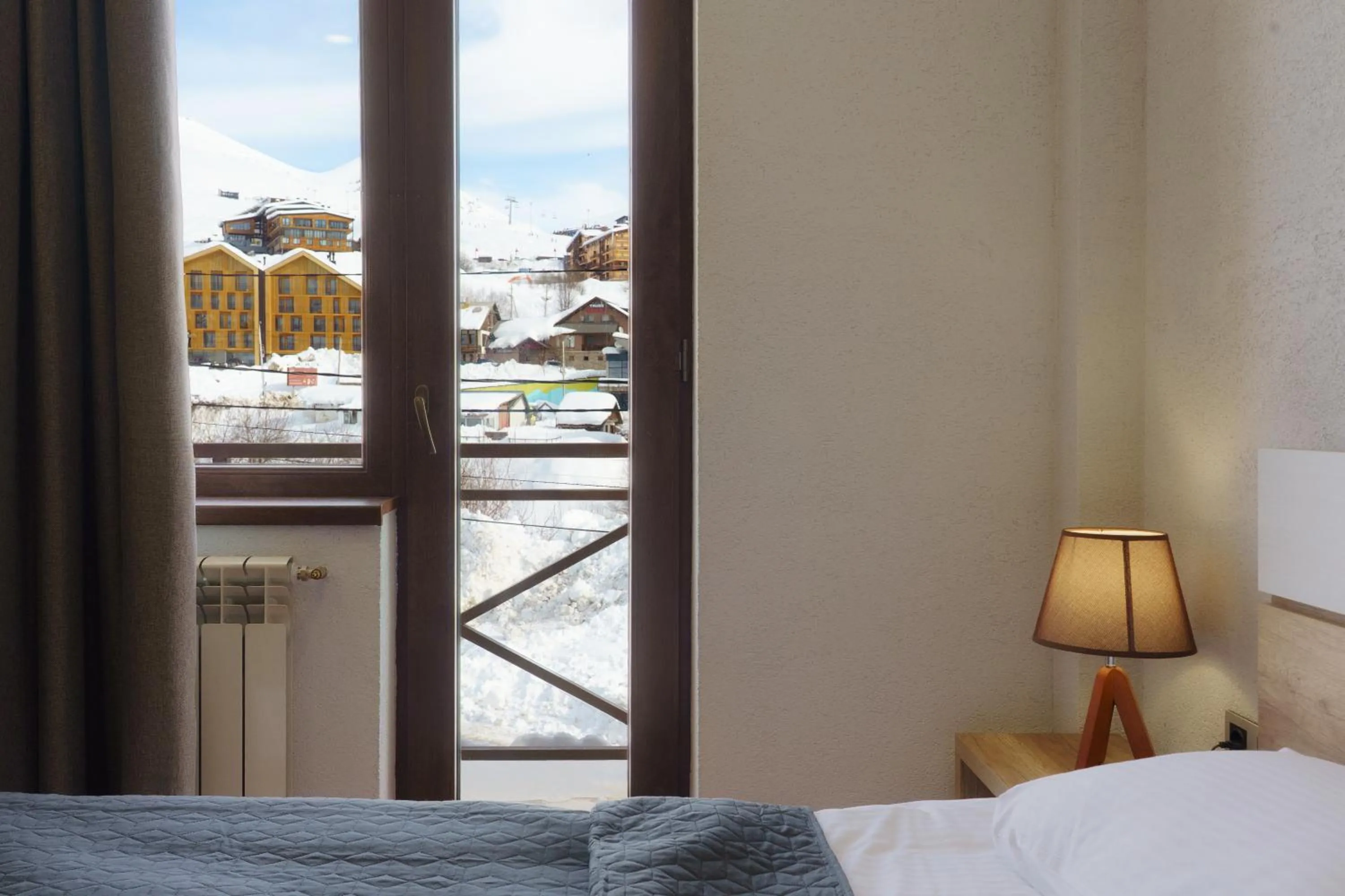 Bed in Ereto Hotel by SnowTime