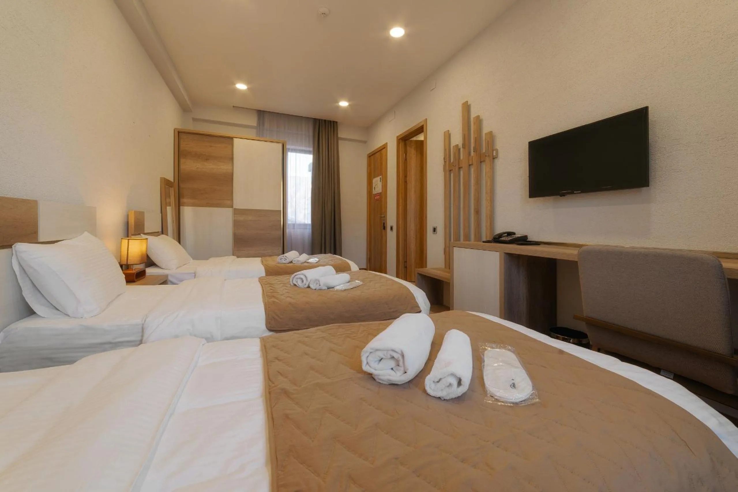 Bed in Ereto Hotel by SnowTime