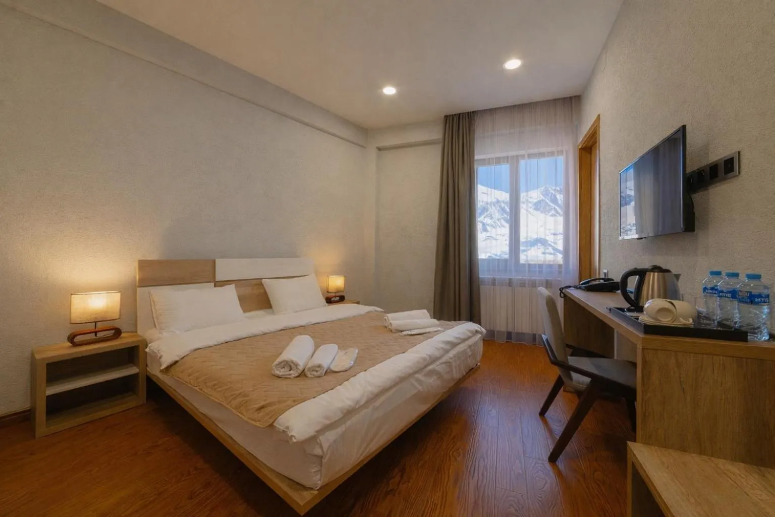 Bed in Ereto Hotel by SnowTime