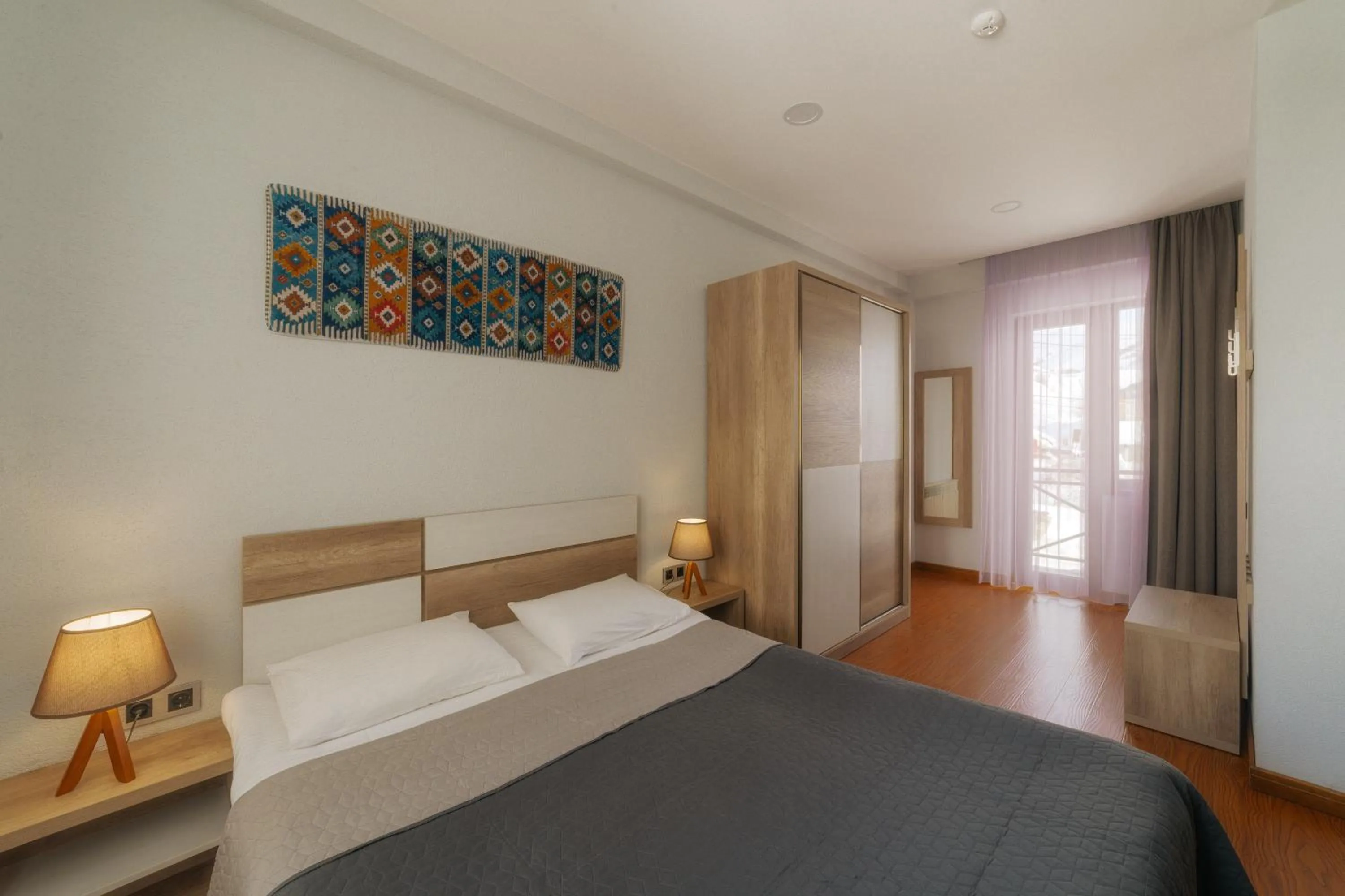 Bed in Ereto Hotel by SnowTime