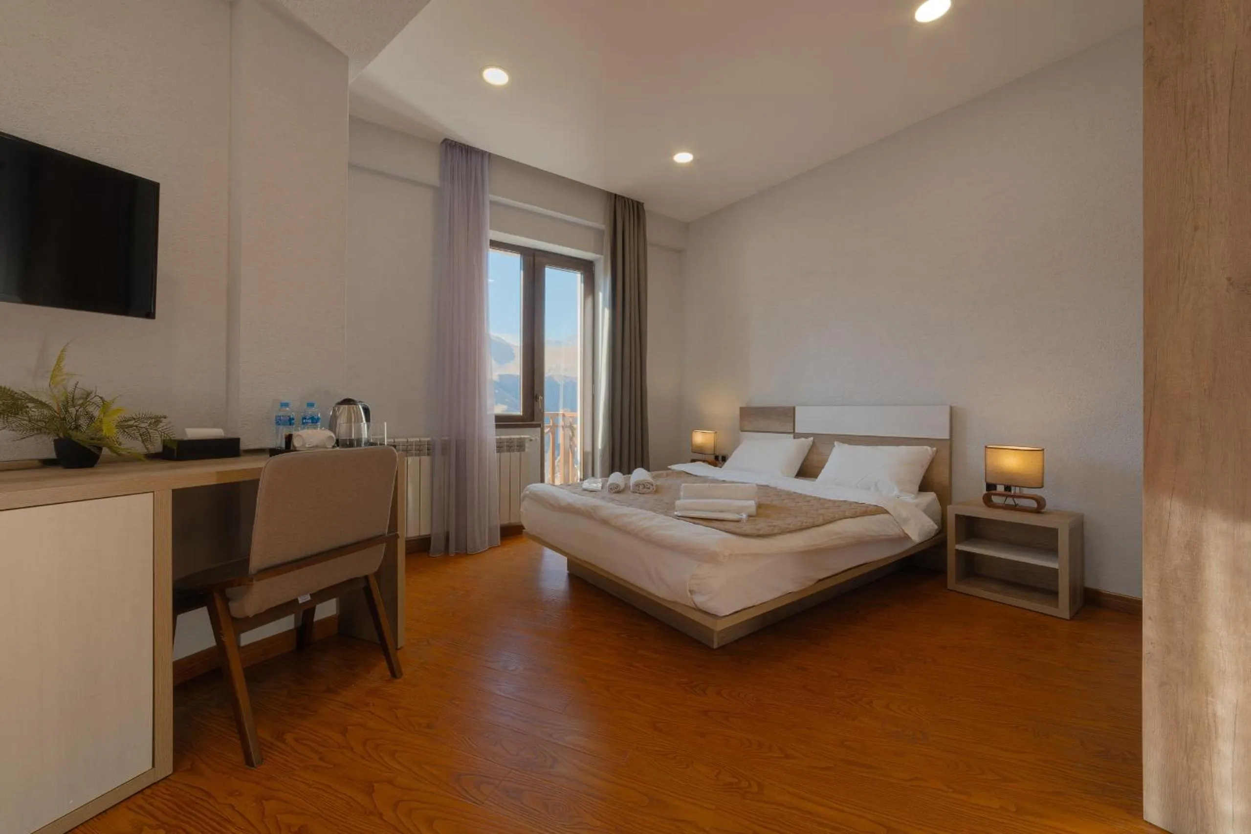 Bed in Ereto Hotel by SnowTime