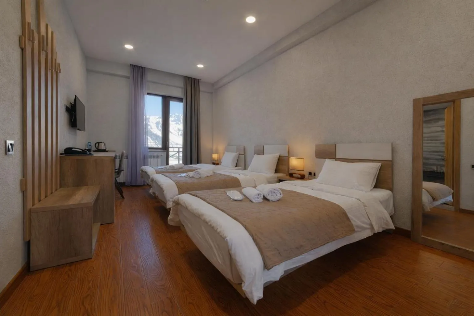 Bed in Ereto Hotel by SnowTime