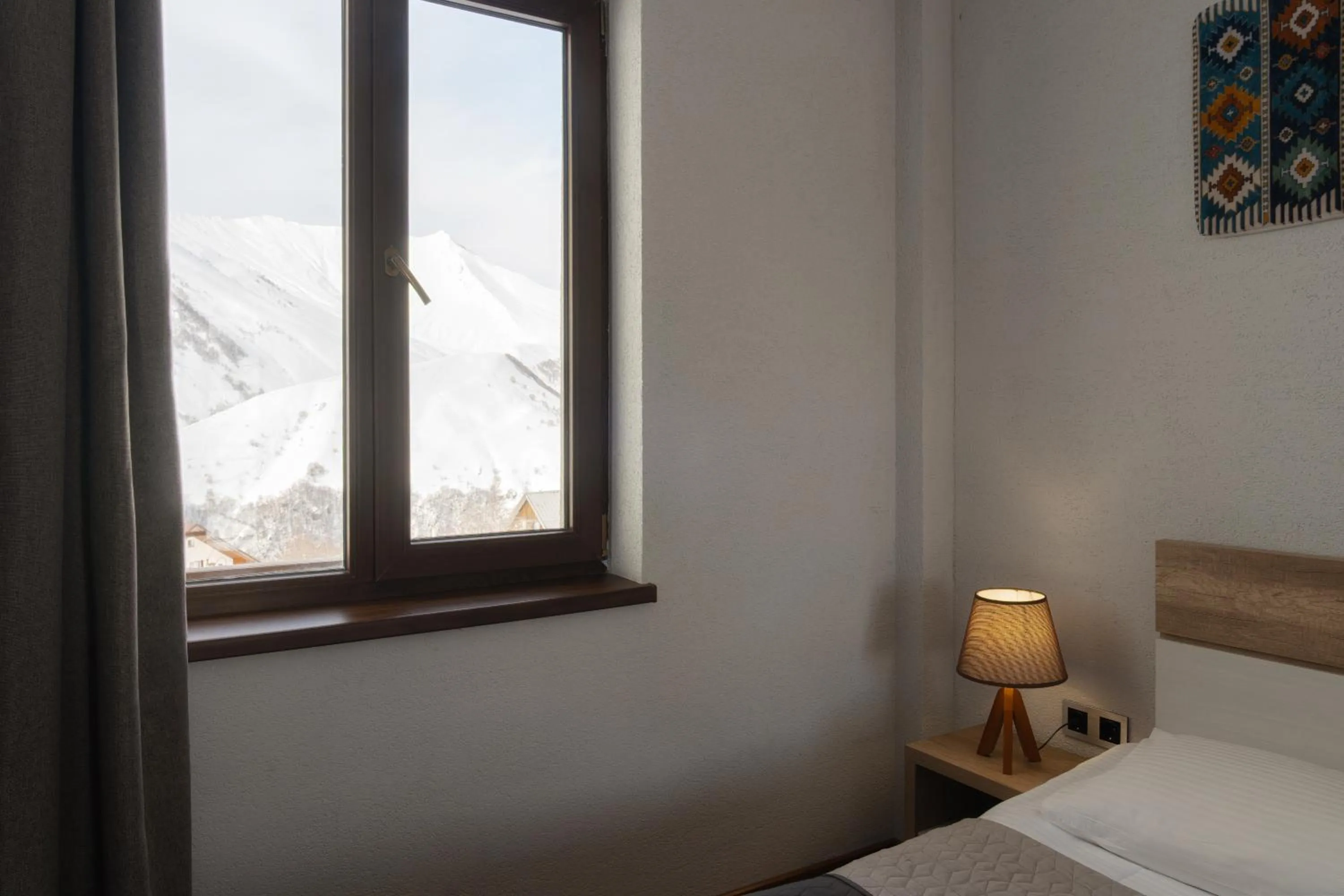 Bed in Ereto Hotel by SnowTime