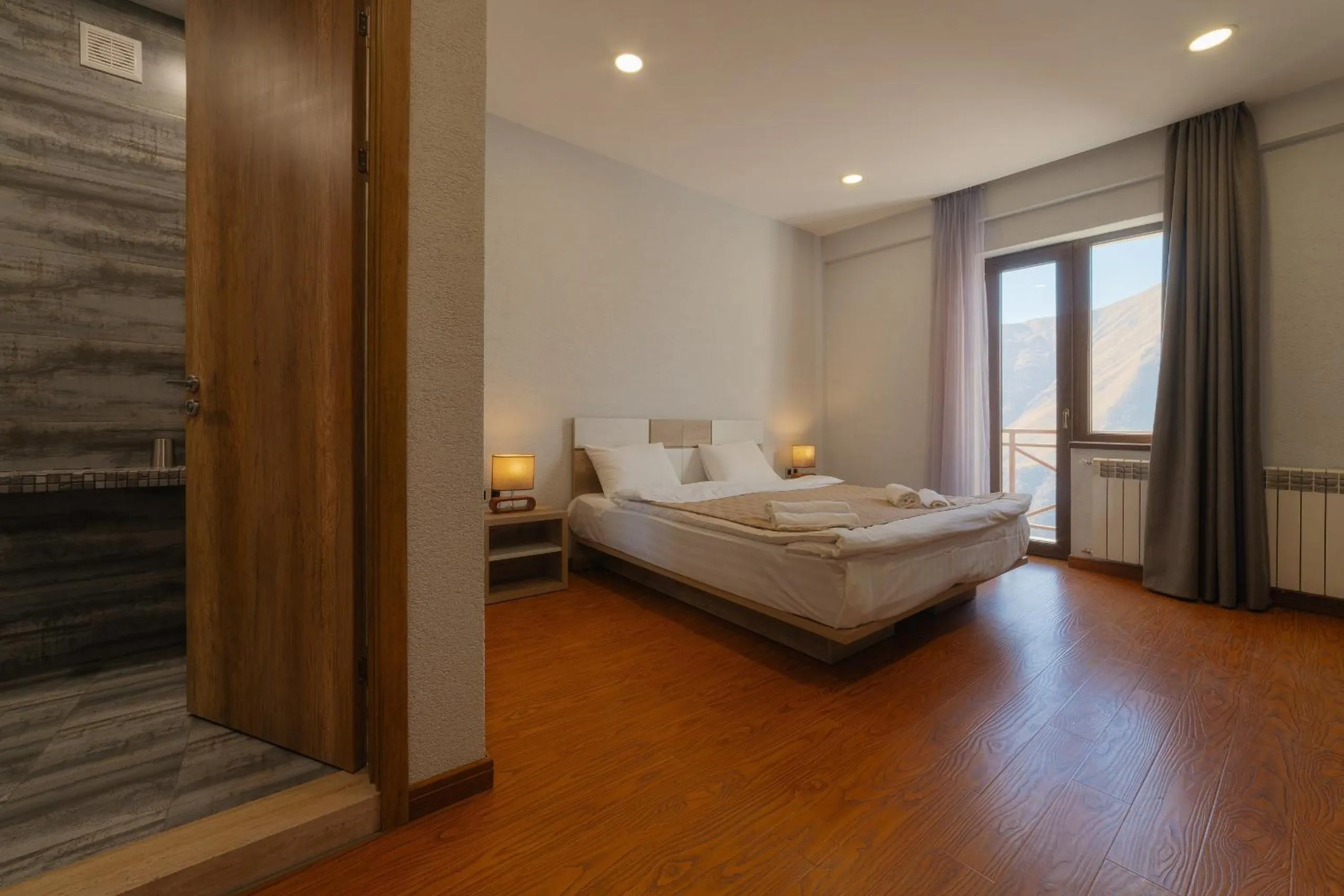 Bed in Ereto Hotel by SnowTime