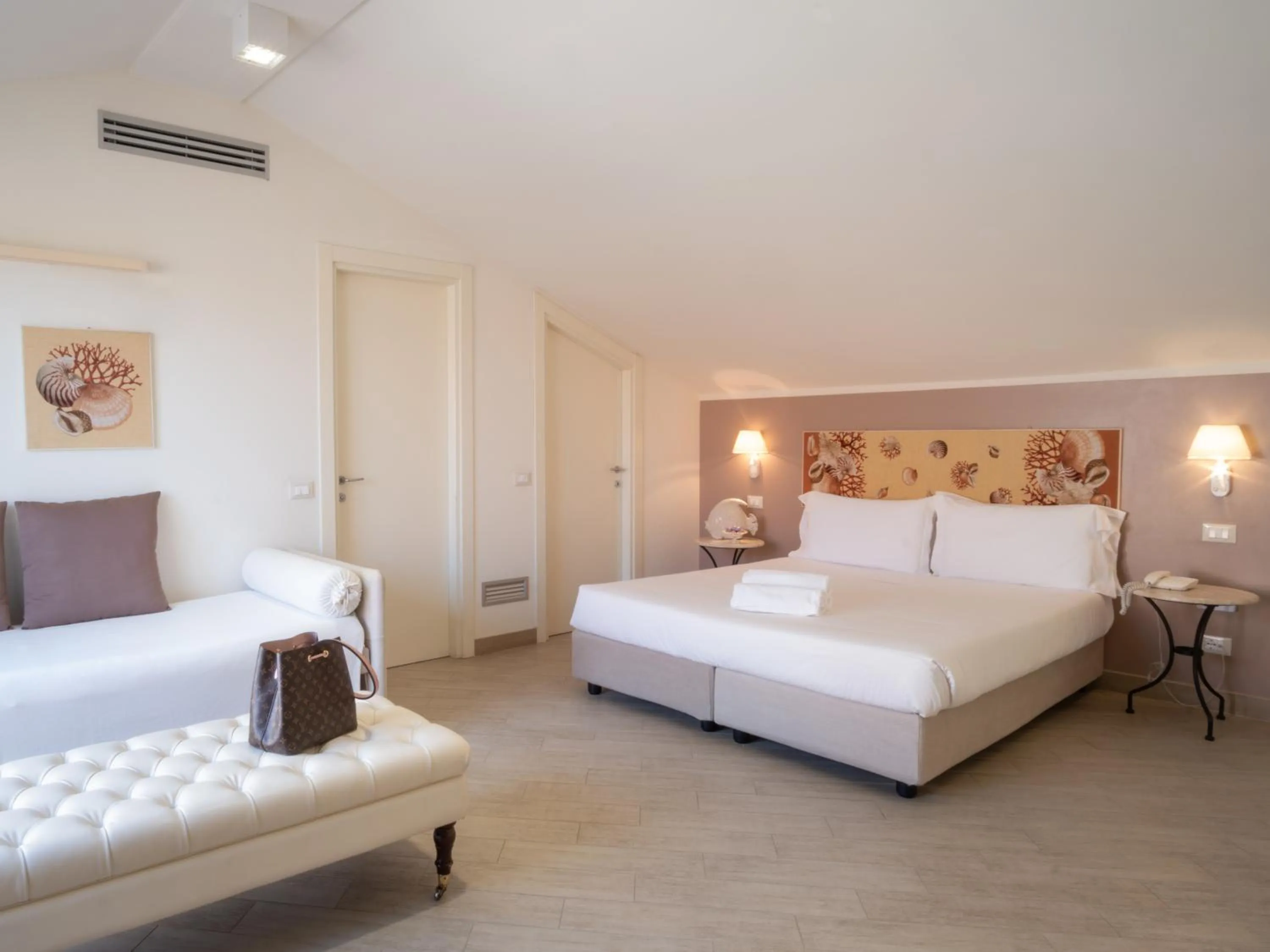 Bed in Hotel San Pietro Palace