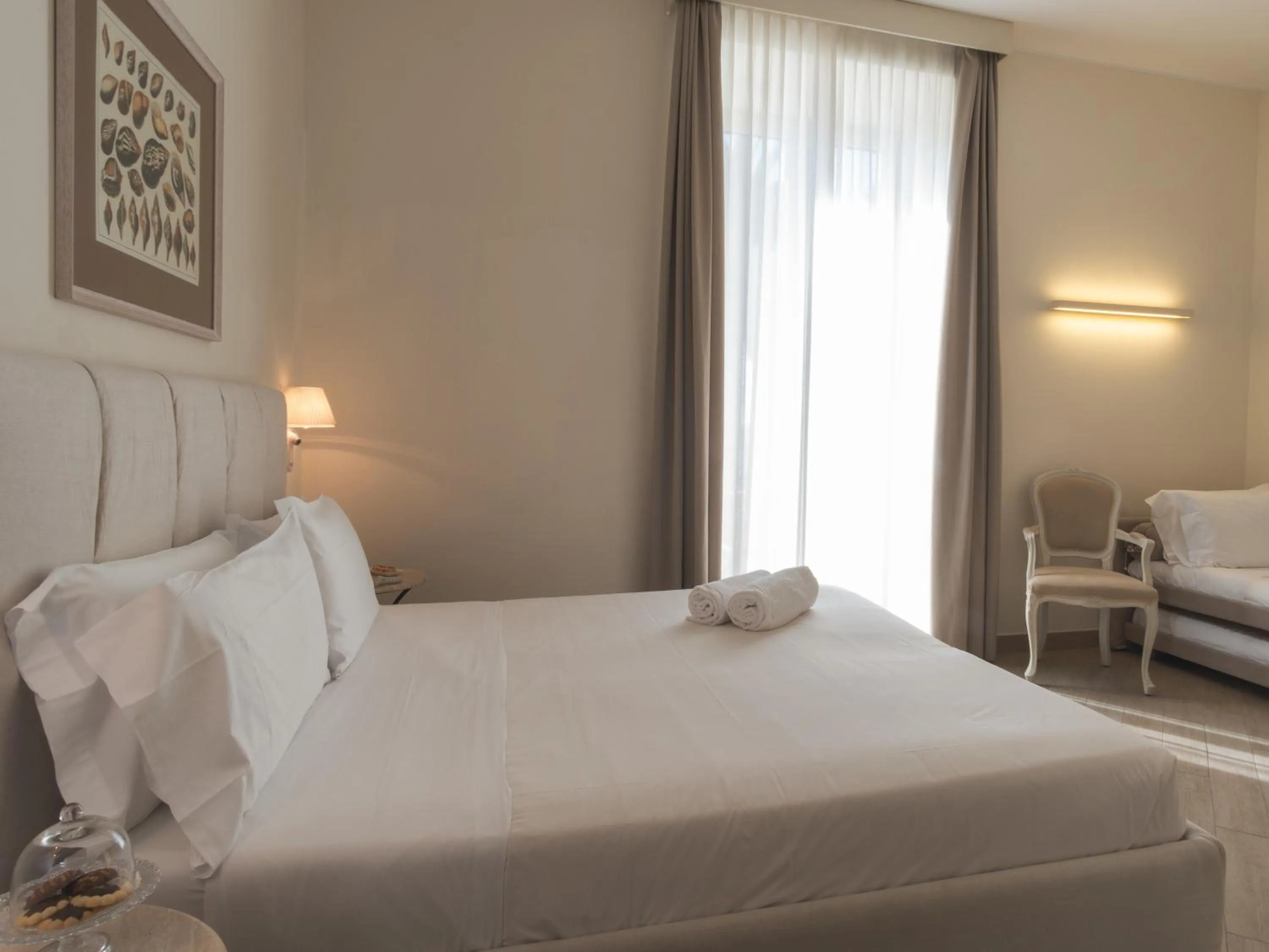 Bed in Hotel San Pietro Palace