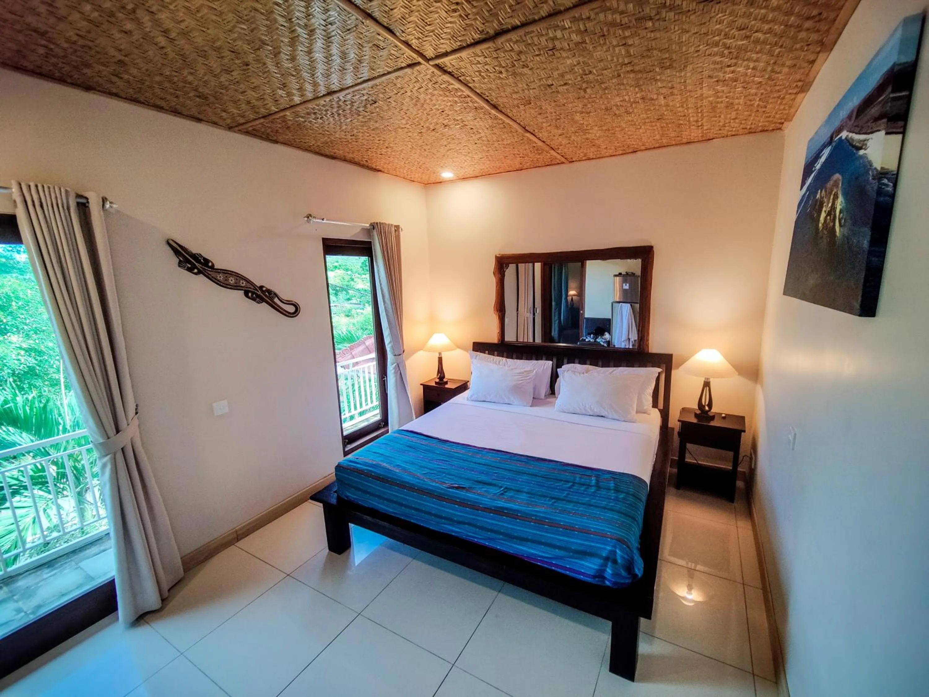 Bed in Ekas Surf Resort & Surf Camp