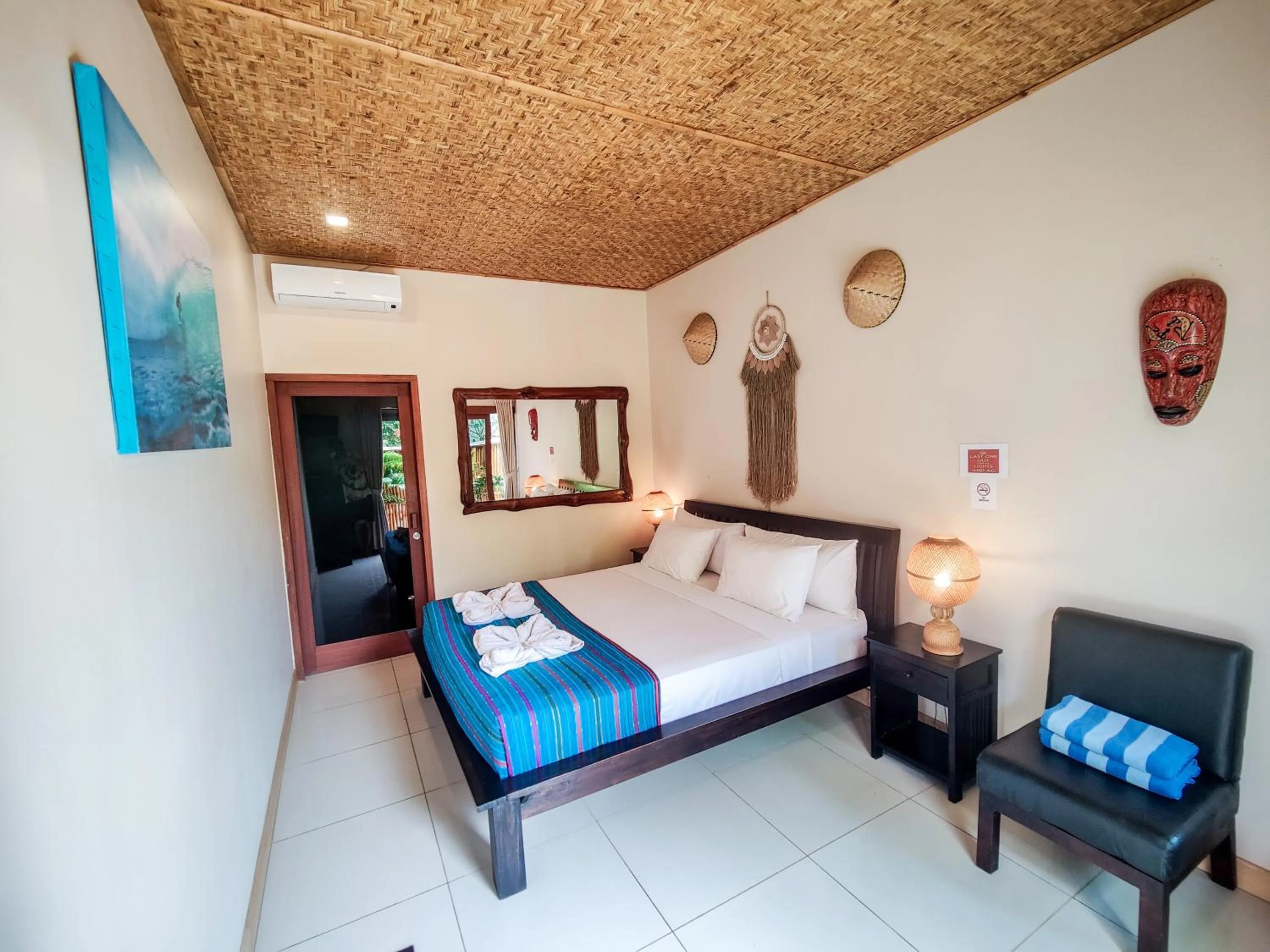 Bed in Ekas Surf Resort & Surf Camp