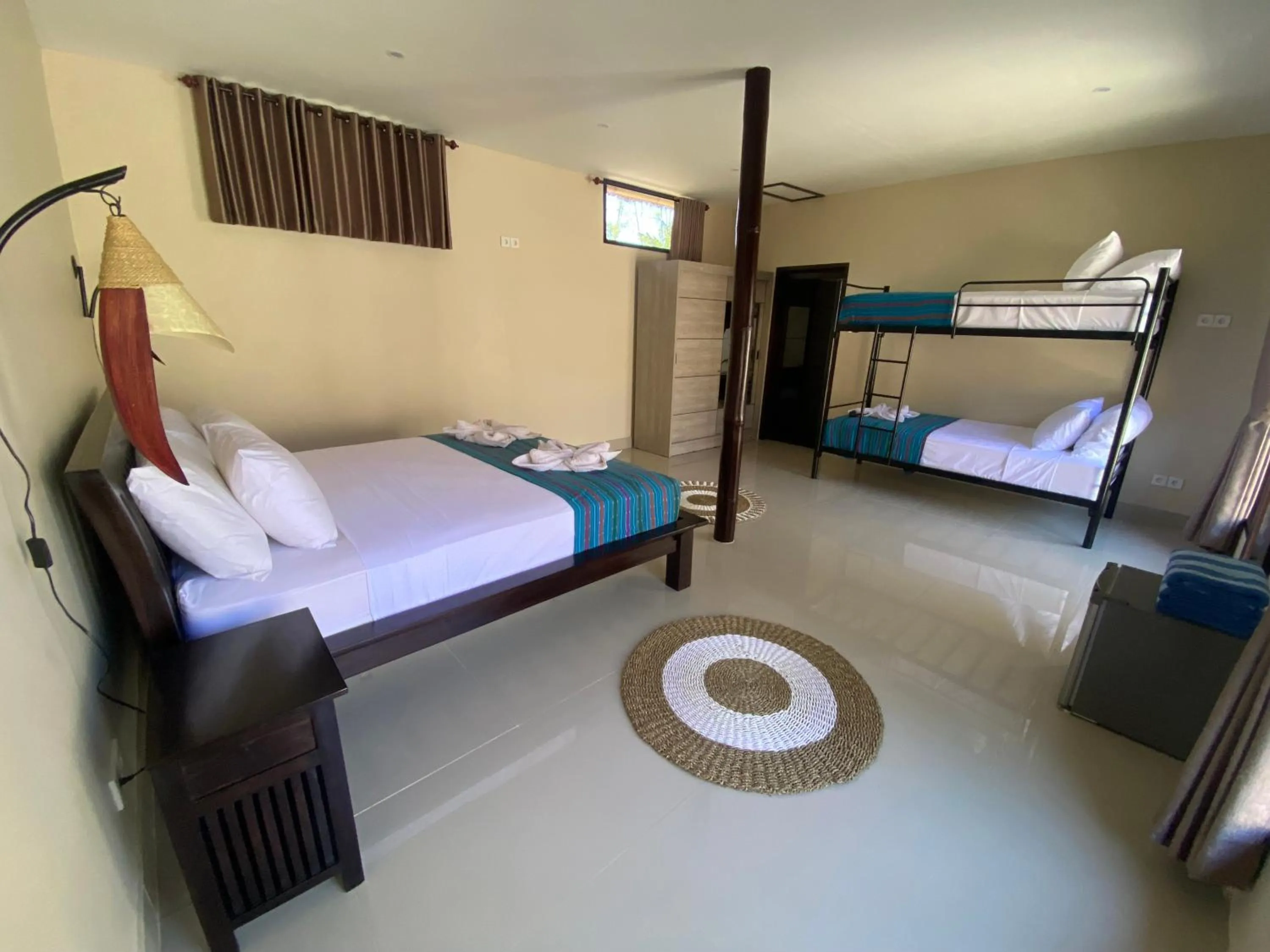Bed in Ekas Surf Resort & Surf Camp