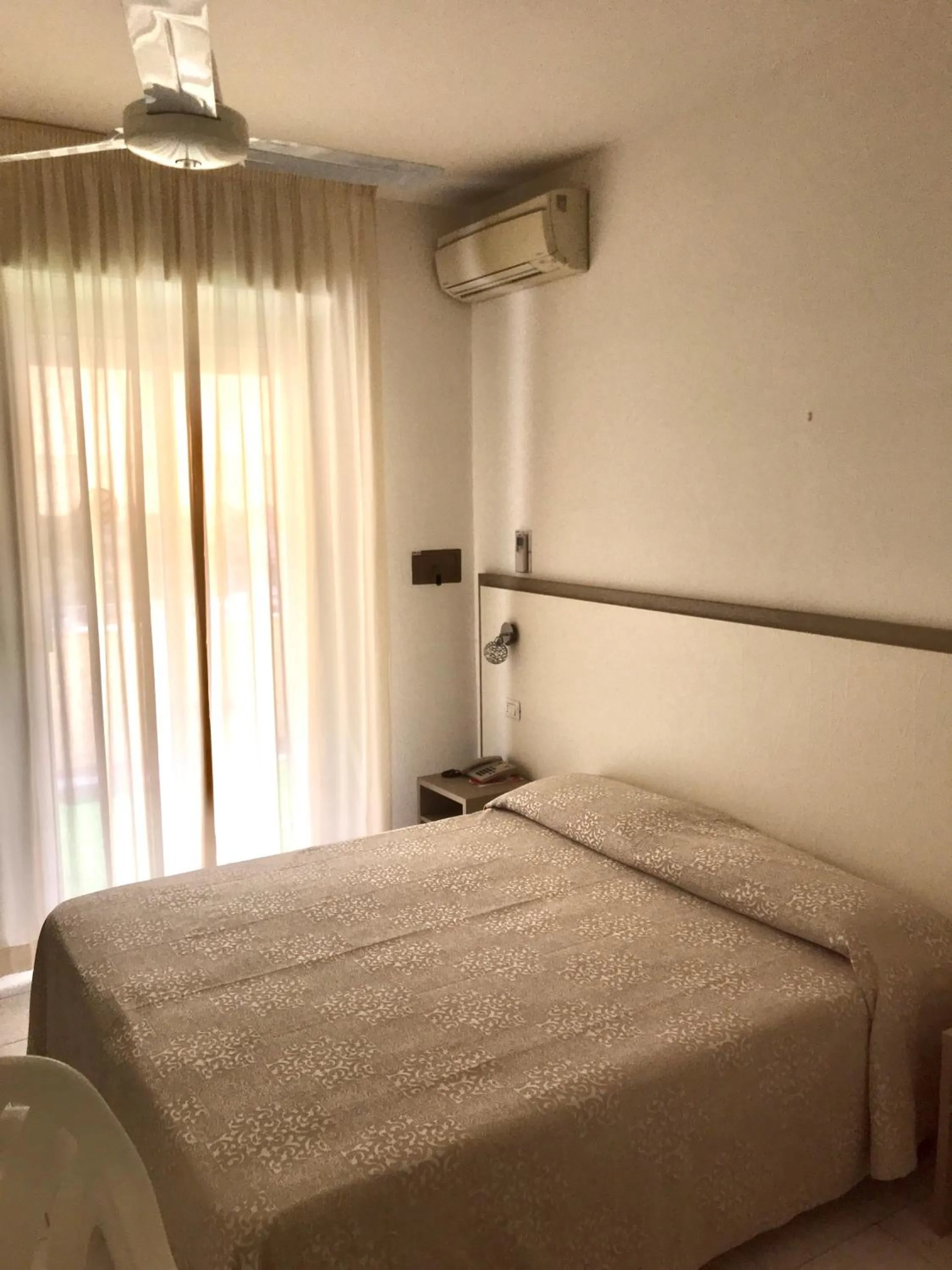 Bed in Hotel Rivamare