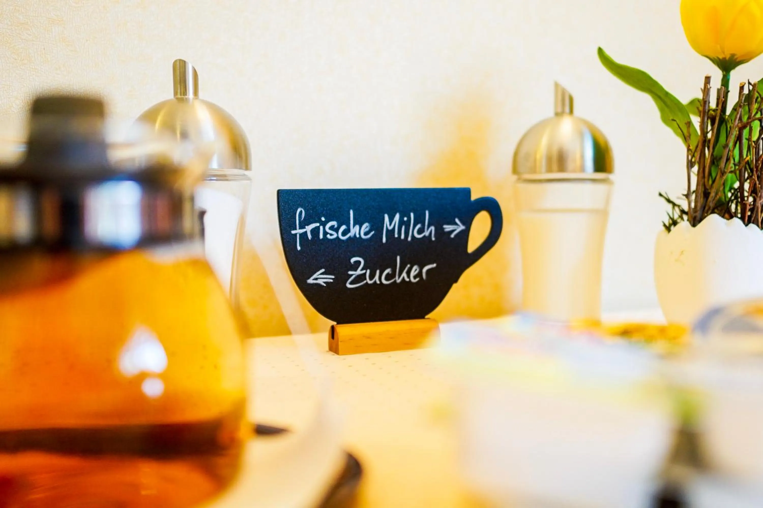 Property logo or sign in Hotel Sauer Garni