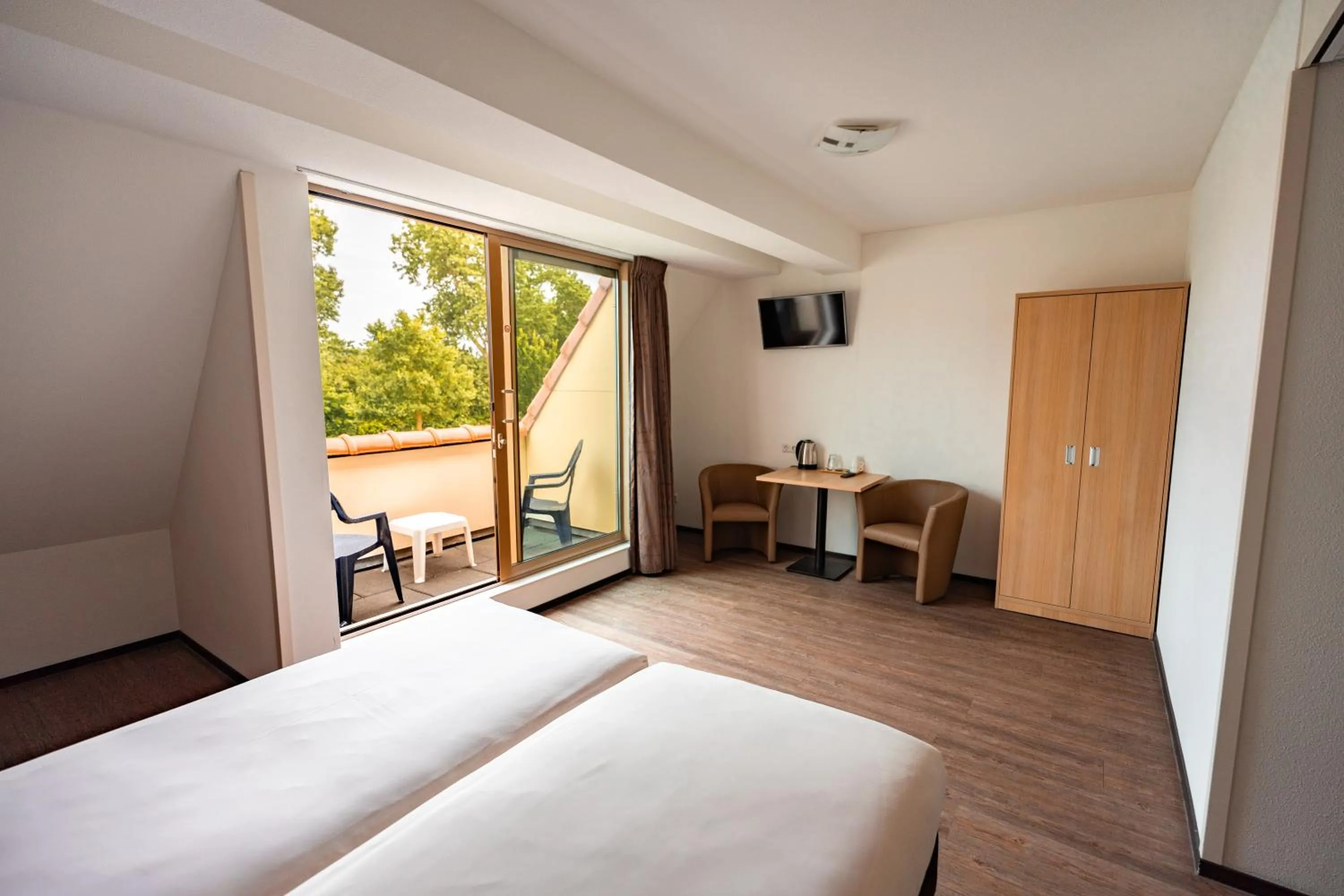 Photo of the whole room, Bed in Hotel het Zwaantje