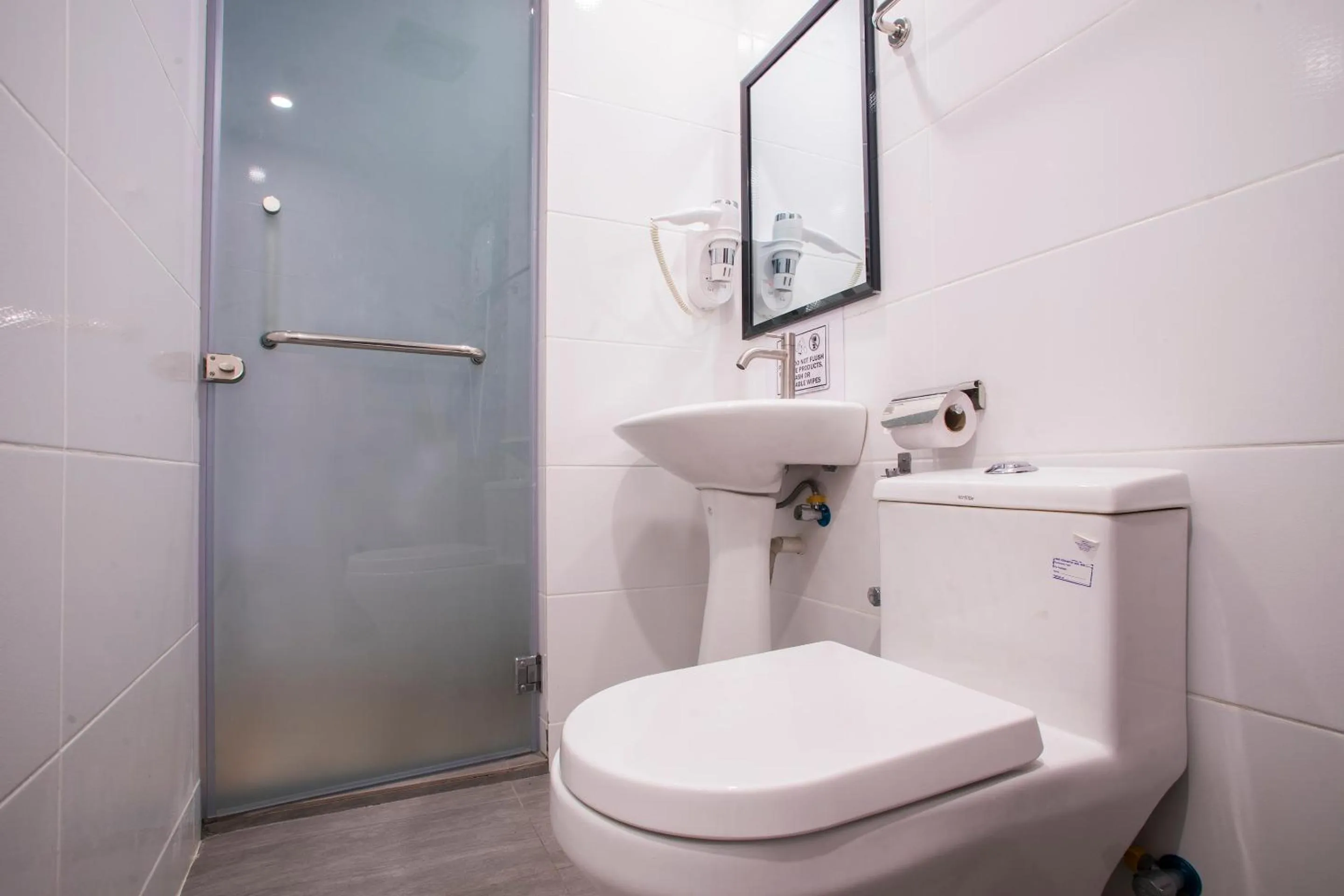 Bathroom in Hotel O Gs Hotels Near Strand Mall