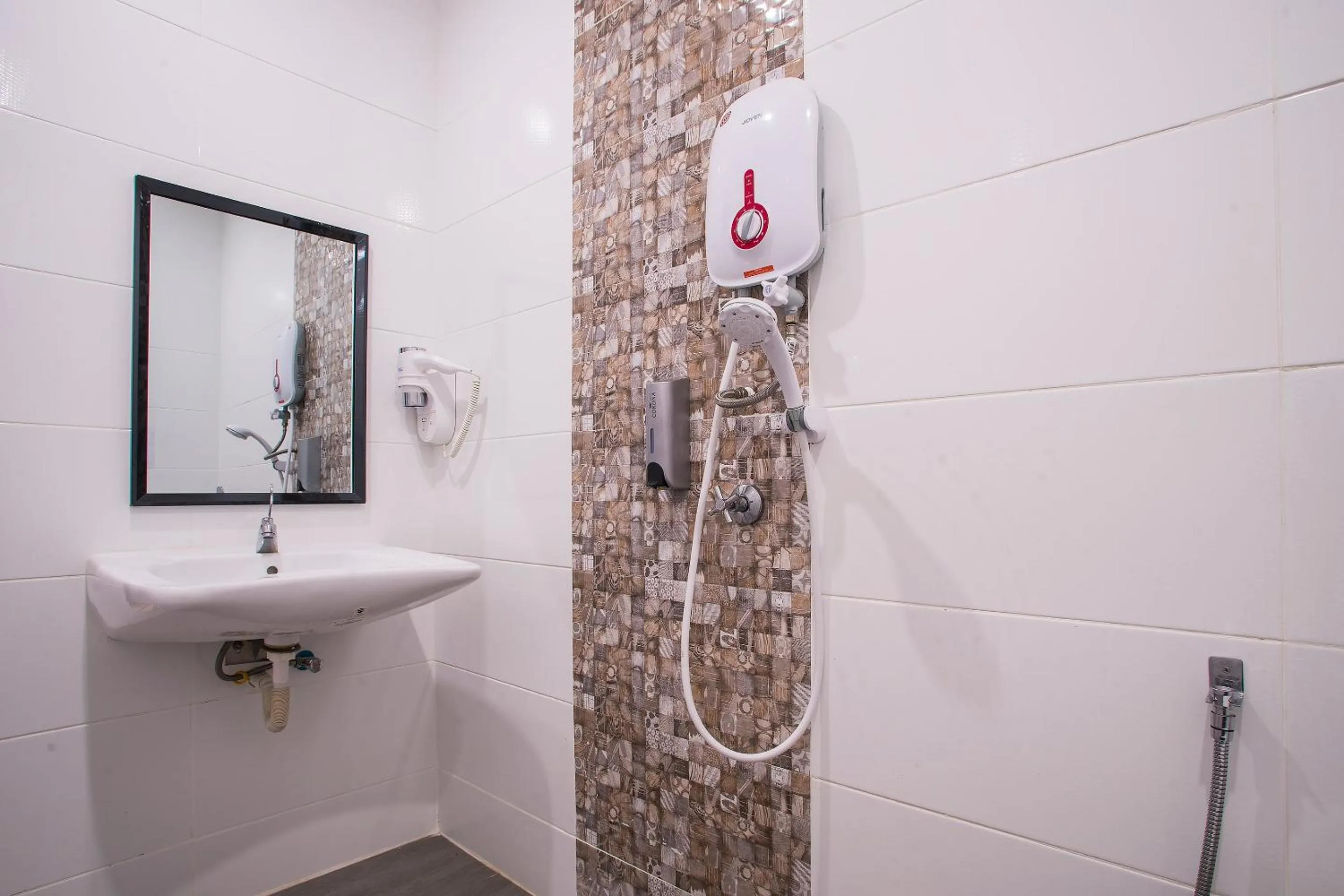 Bathroom in Hotel O Gs Hotels Near Strand Mall