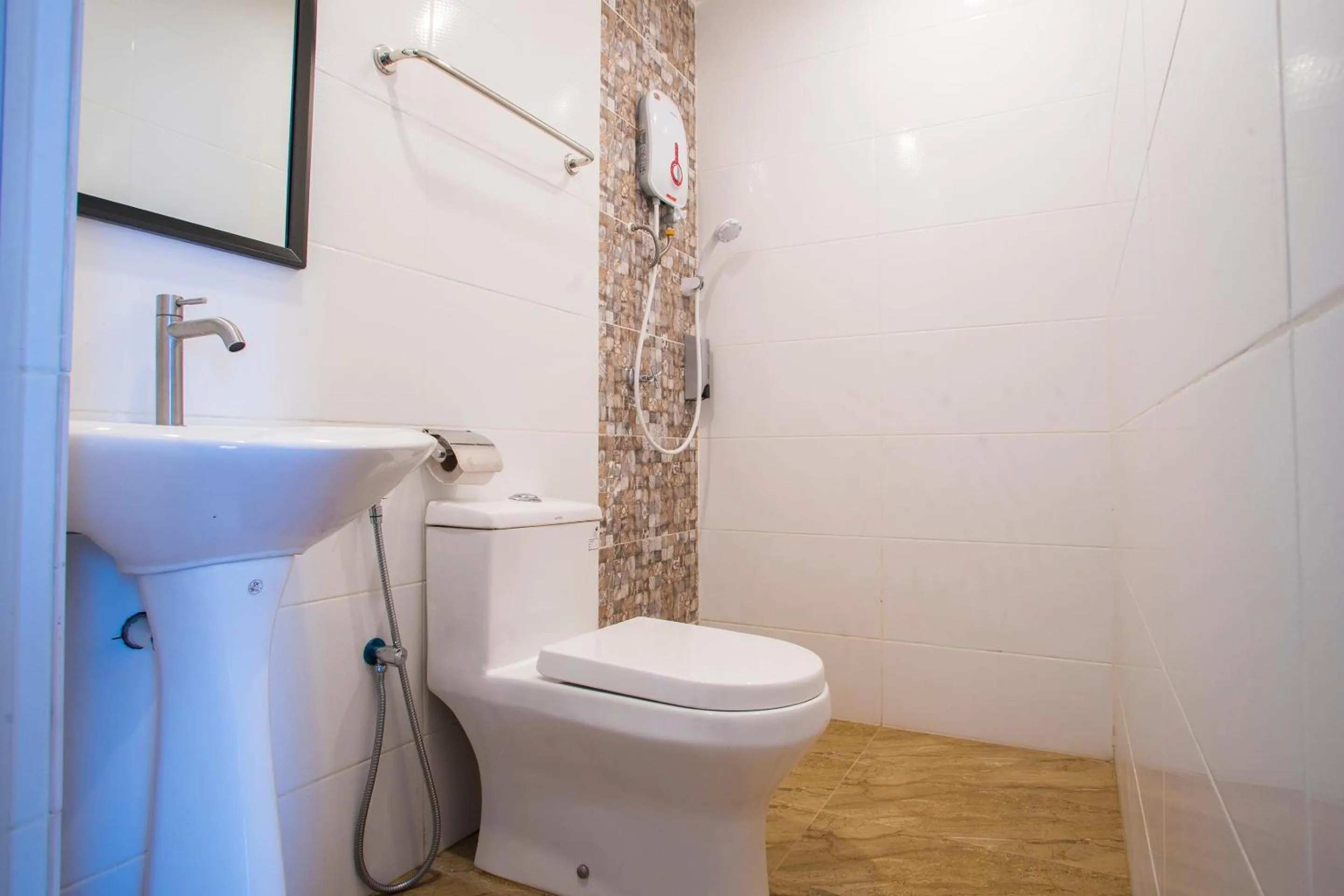 Bedroom in Hotel O Gs Hotels Near Strand Mall