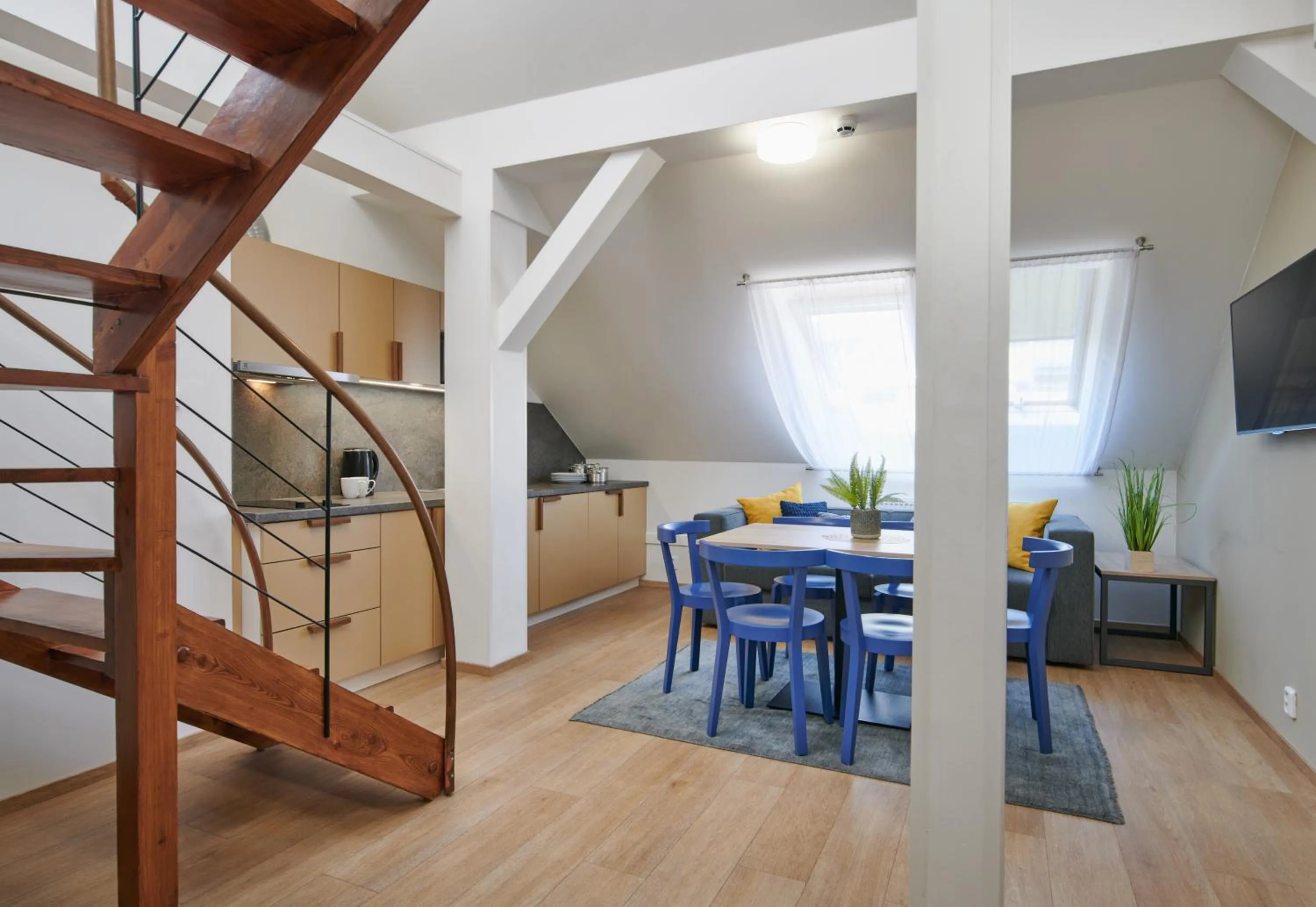 Seating area in City Nest Apartments by Adrez