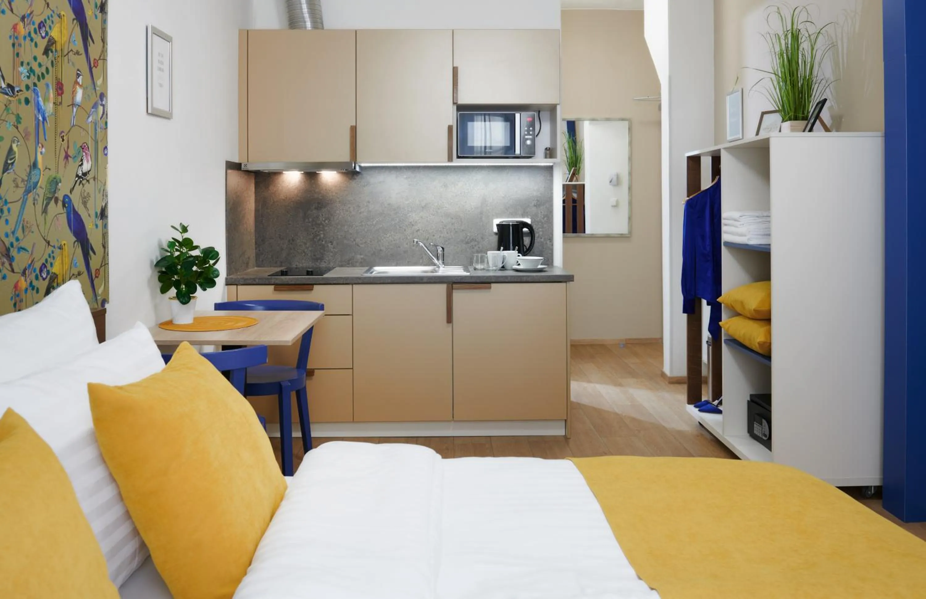 Kitchen or kitchenette, Bed in City Nest Apartments by Adrez