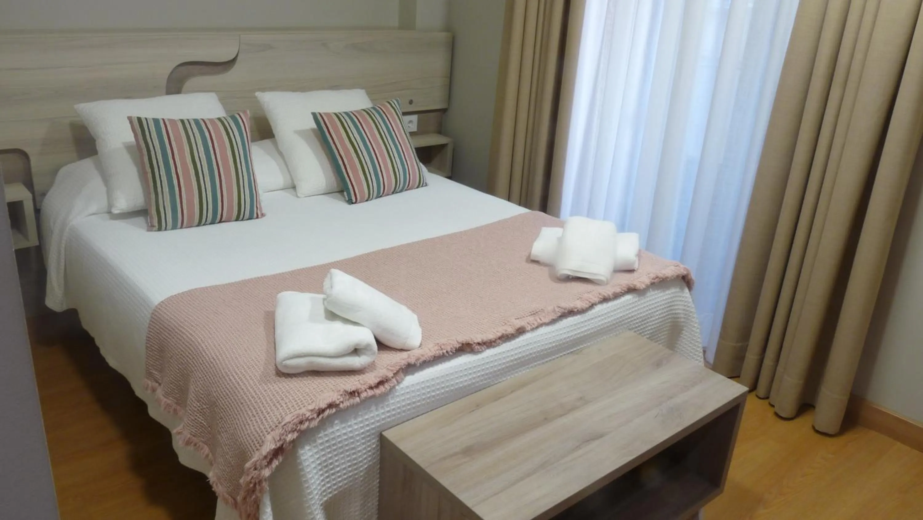 Decorative detail, Bed in Hotel Roquiño