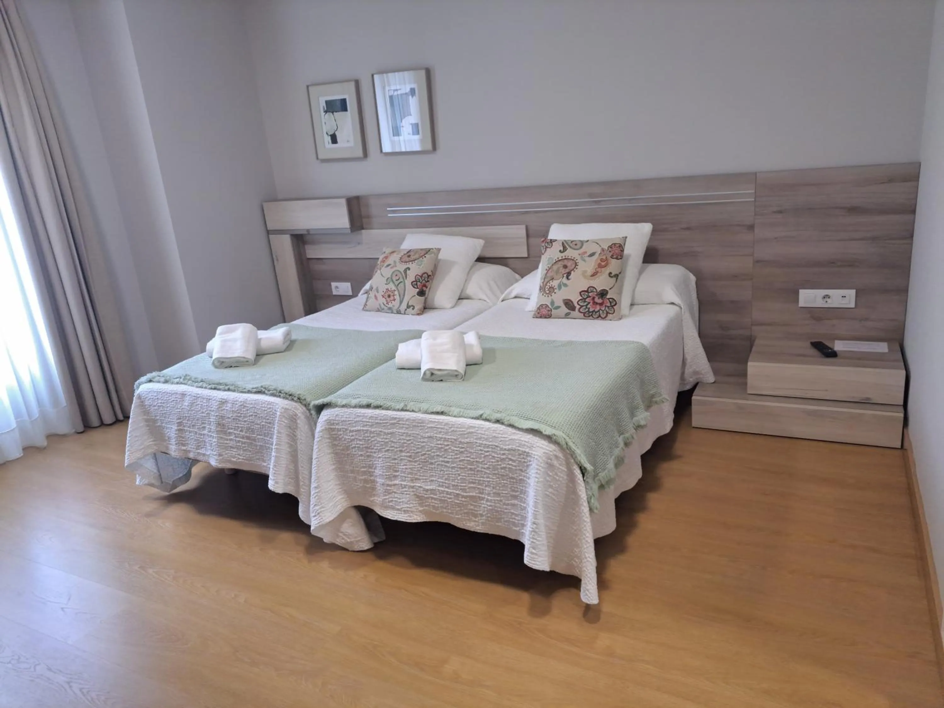 Bed in Hotel Roquiño