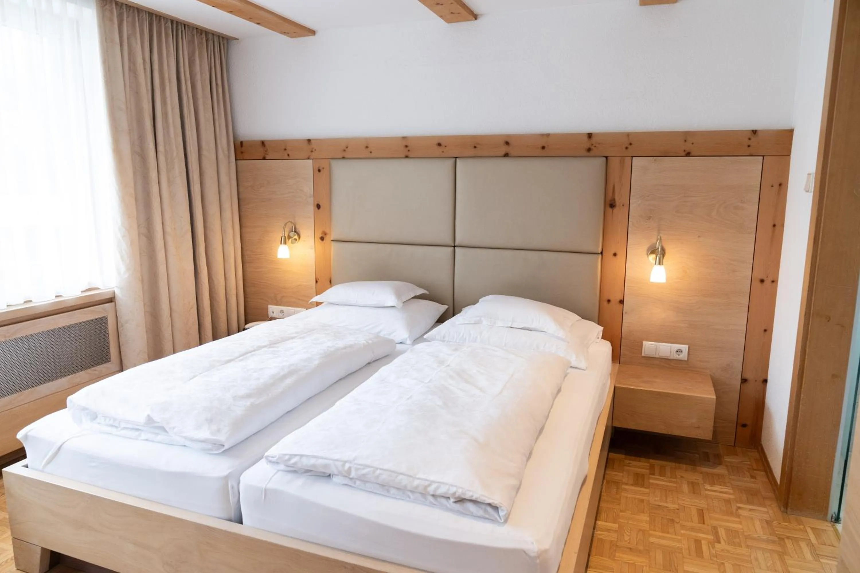 Bed in Wellnesshotel Mein Almhof Superior