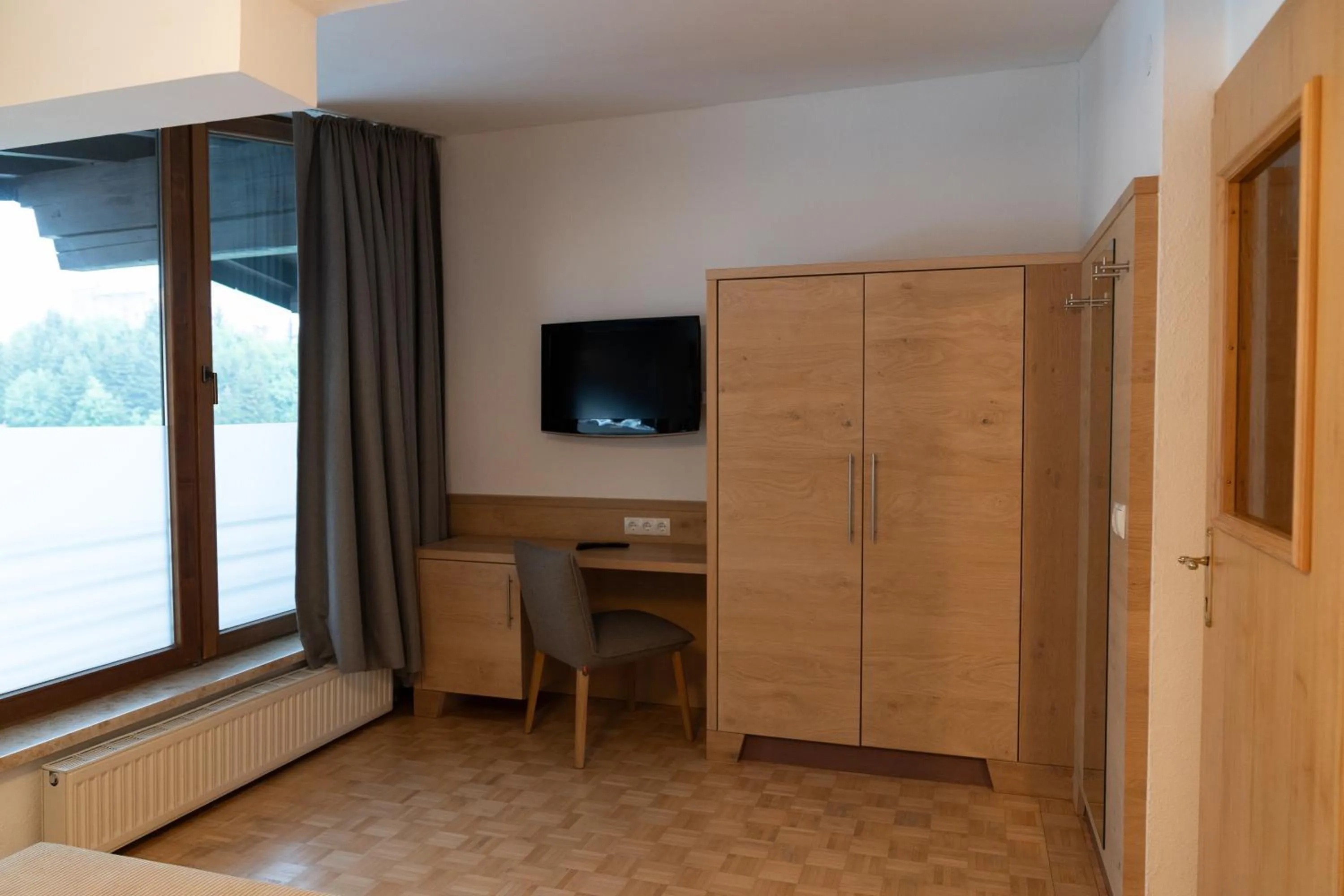 Communal lounge/ TV room in Wellnesshotel Mein Almhof Superior