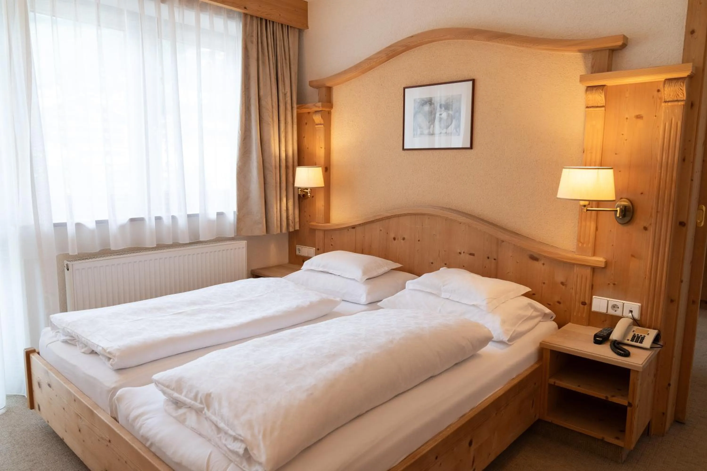 Bed in Wellnesshotel Mein Almhof Superior