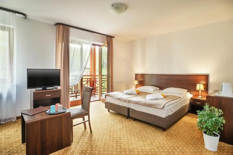 Photo of the whole room, Bed in Instytut Zdrowia Sofra FIT & SPA