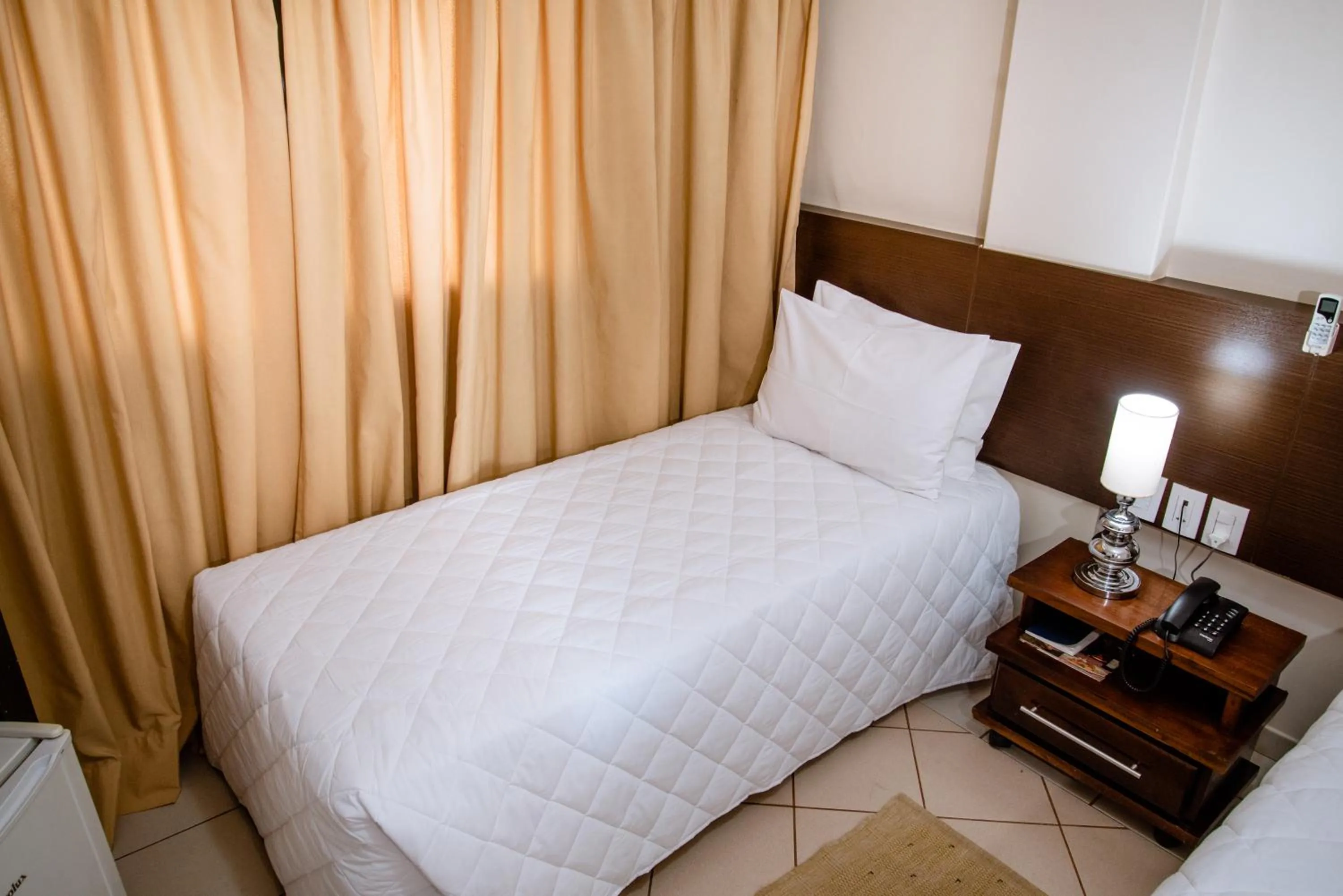 Bed in Imperador Palace Hotel Franca